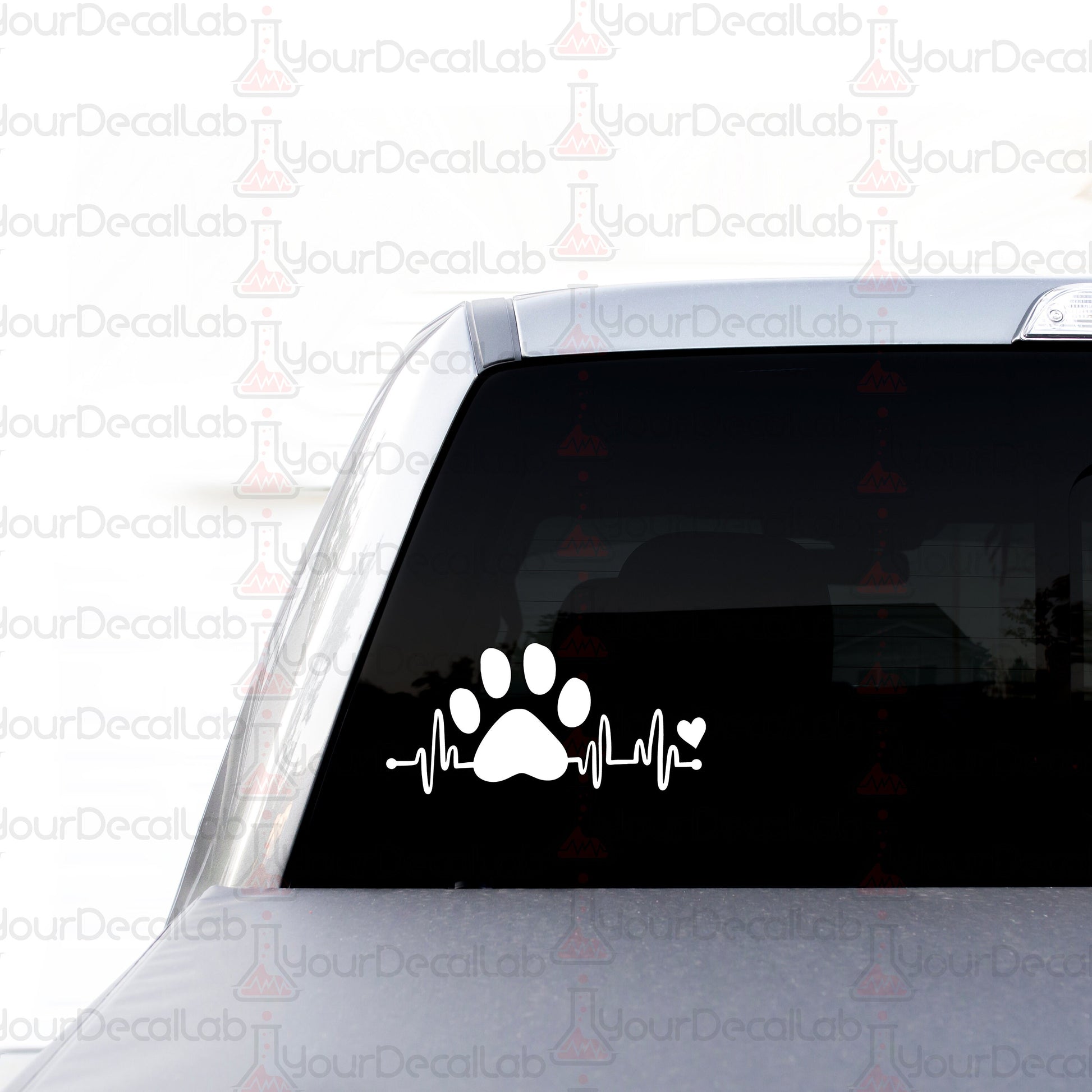 a sticker of a dog&#39;s paw and heartbeat