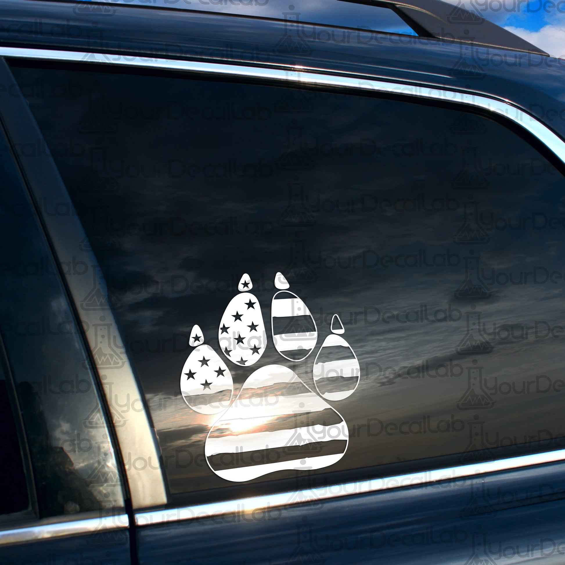 an american flag paw print on the side of a car