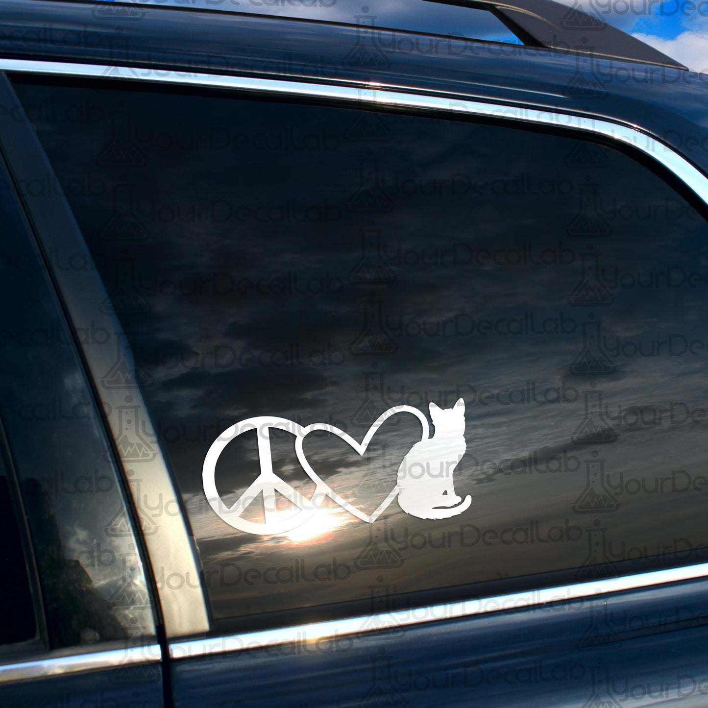 a car with a peace sign and a cat sticker on it