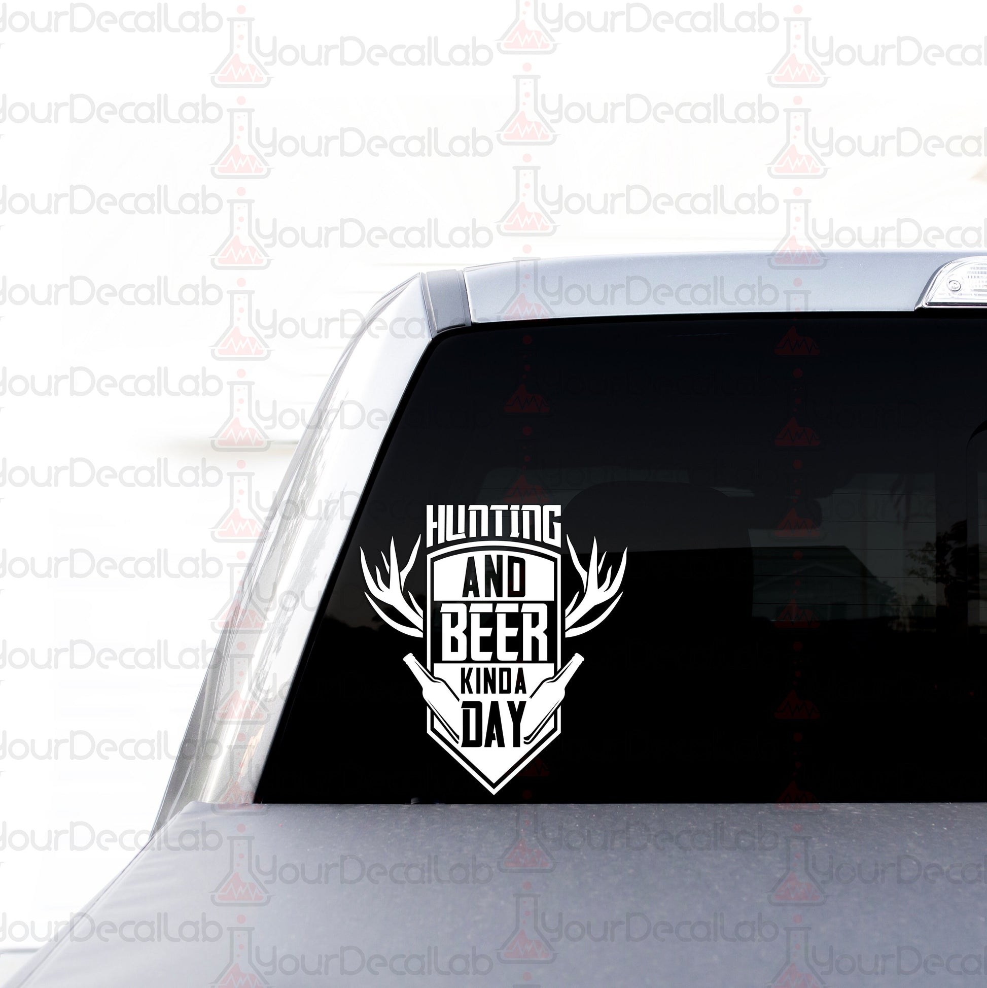 a sticker on the back of a car that says hunting and beer and a