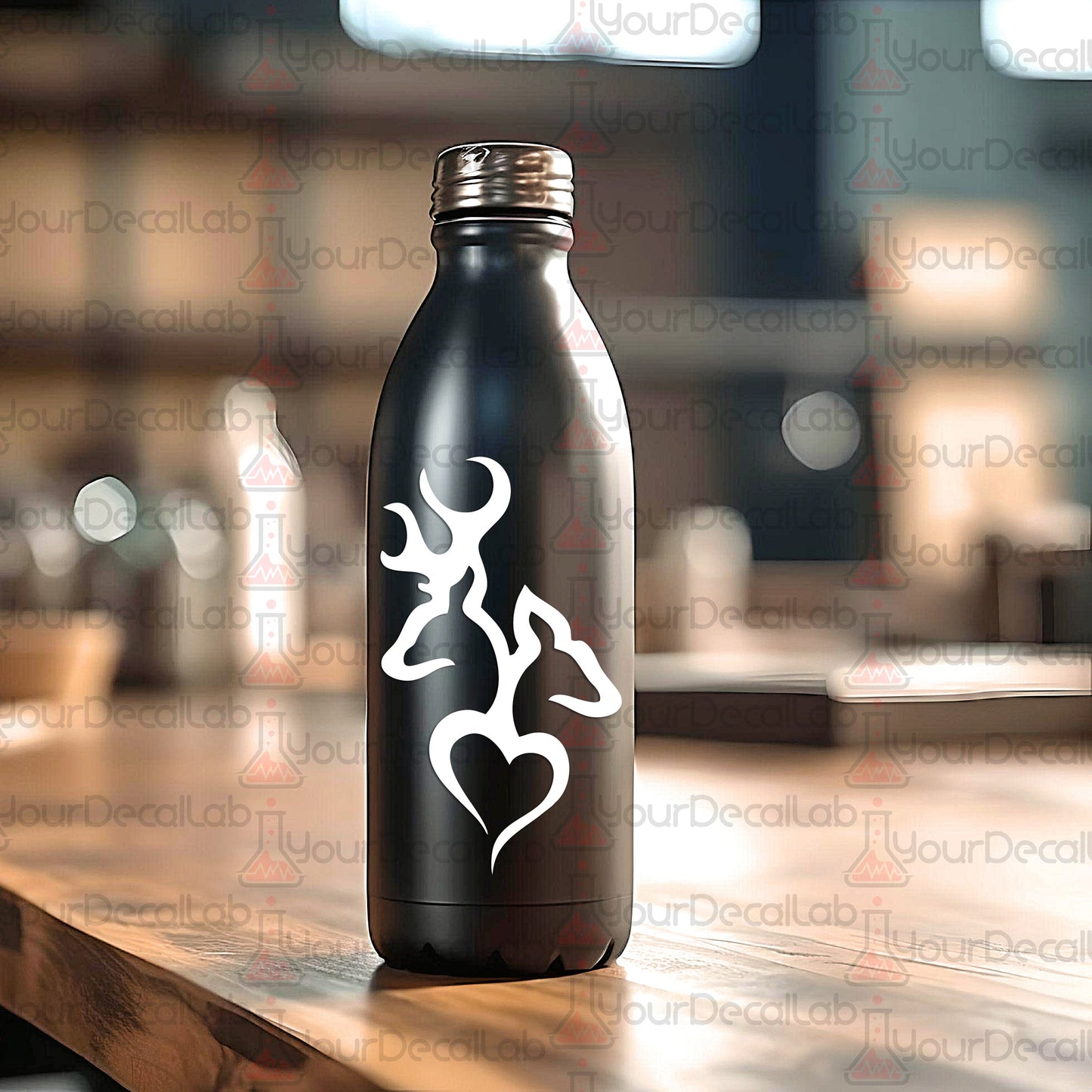 a black bottle with a white design on it