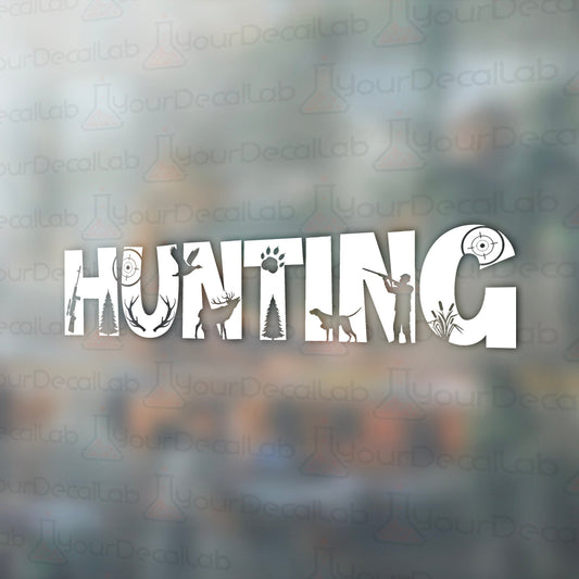 the word hunting is cut out of paper