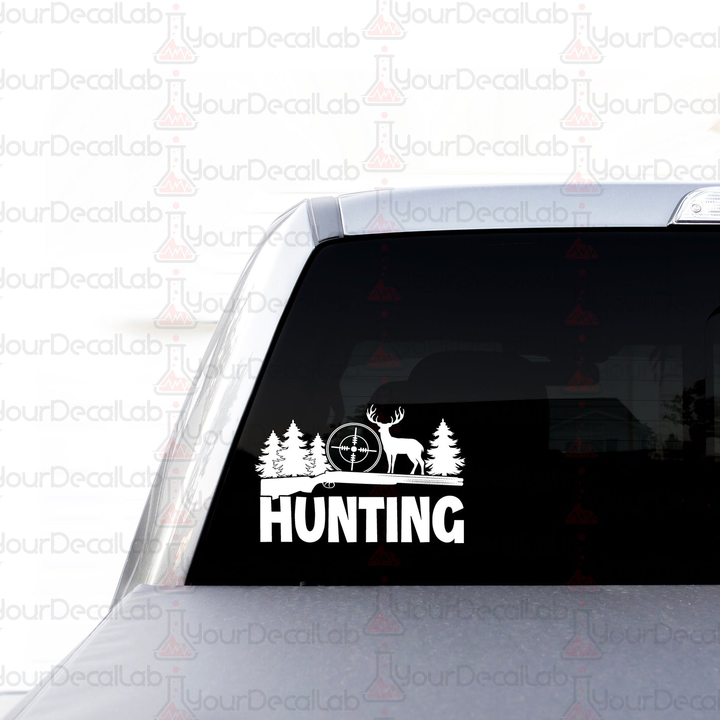 a sticker on the back of a car that says hunting