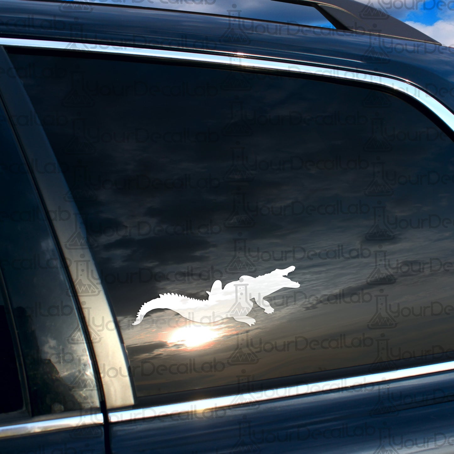 a car with a sticker of a crocodile on it