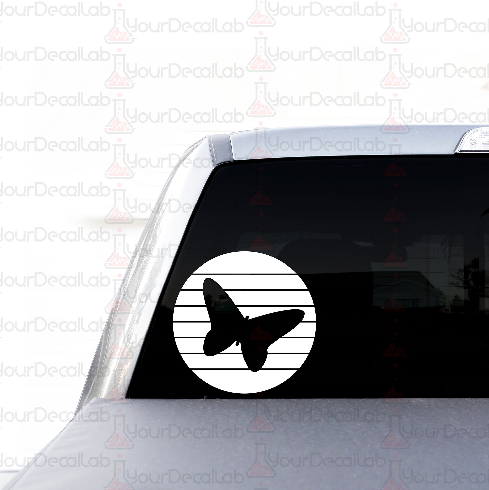 a car with a sticker of a plane in a circle