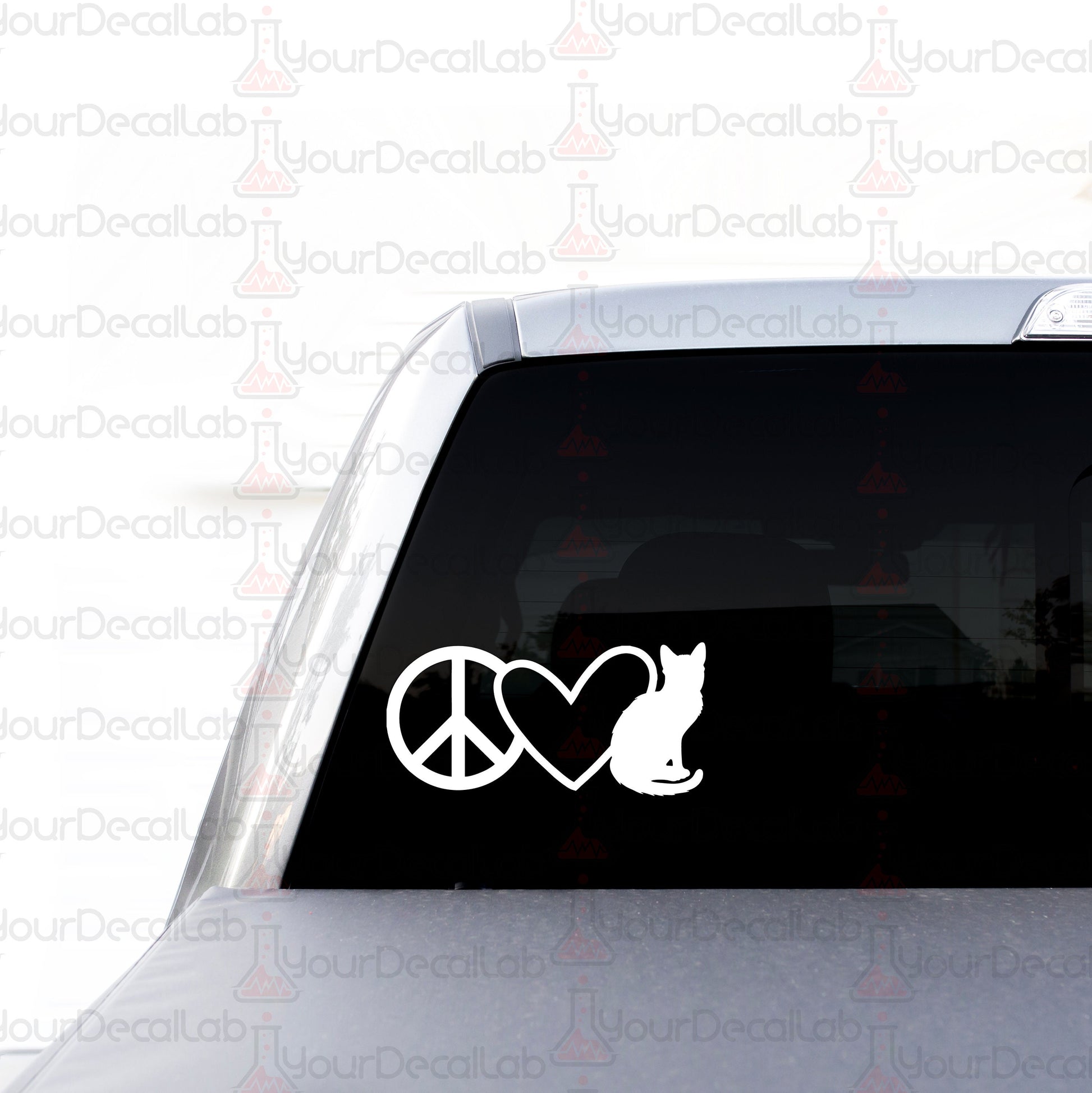 a car with a peace and a cat sticker on it