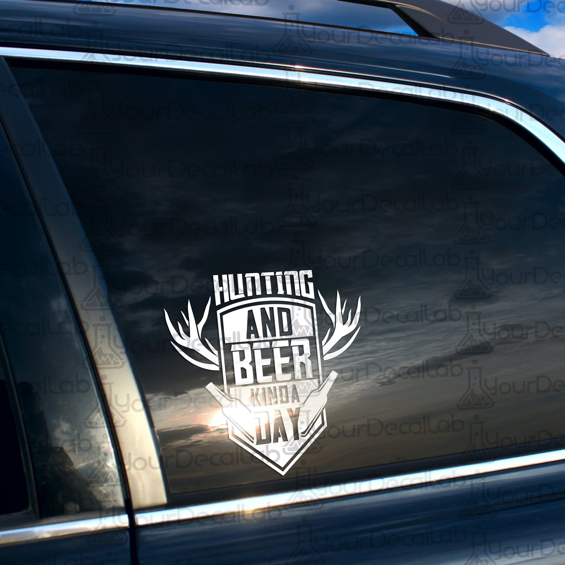 a sticker on the side of a car that says hunting and beer in a
