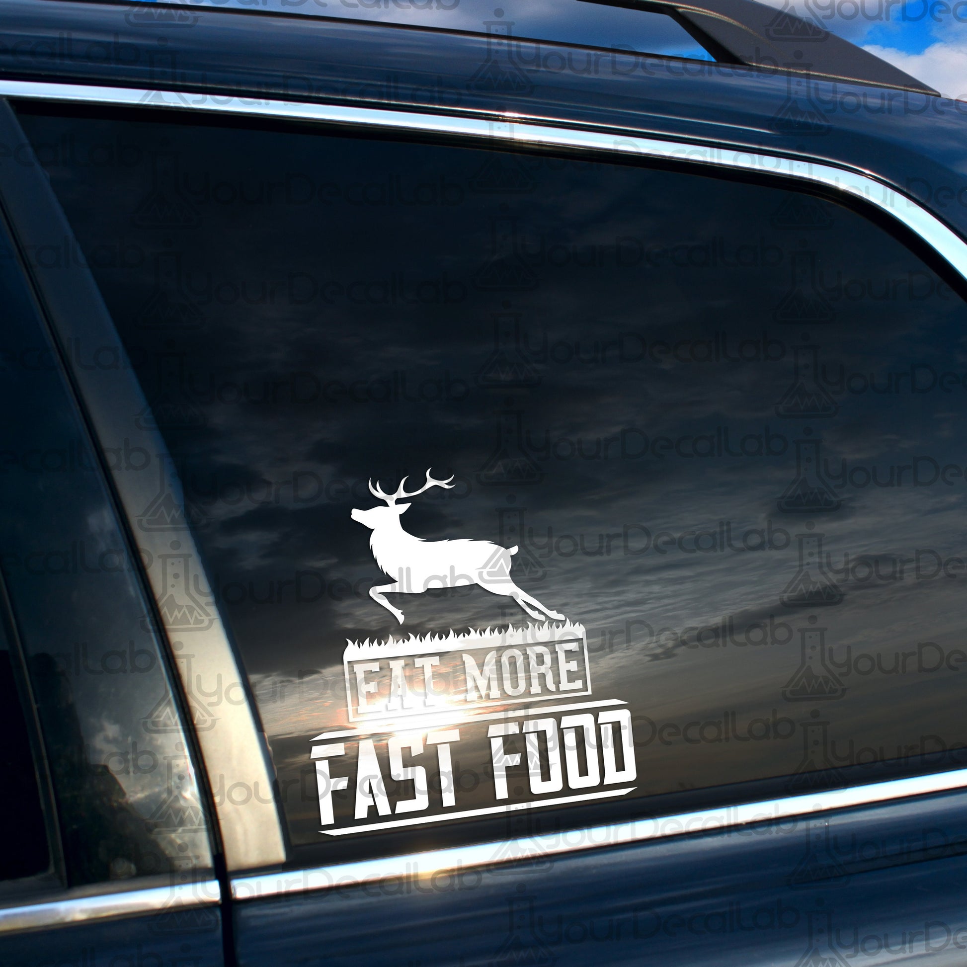 a sticker on the side of a car that says eat more fast food
