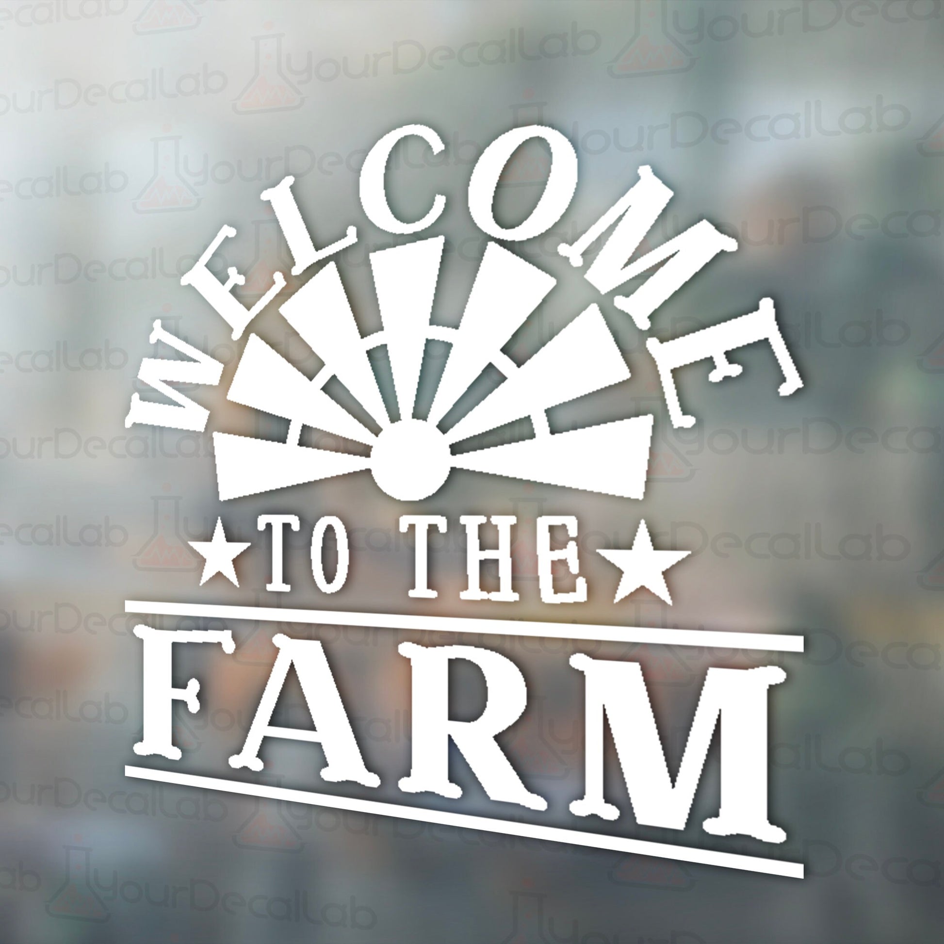 a window with the words welcome to the farm