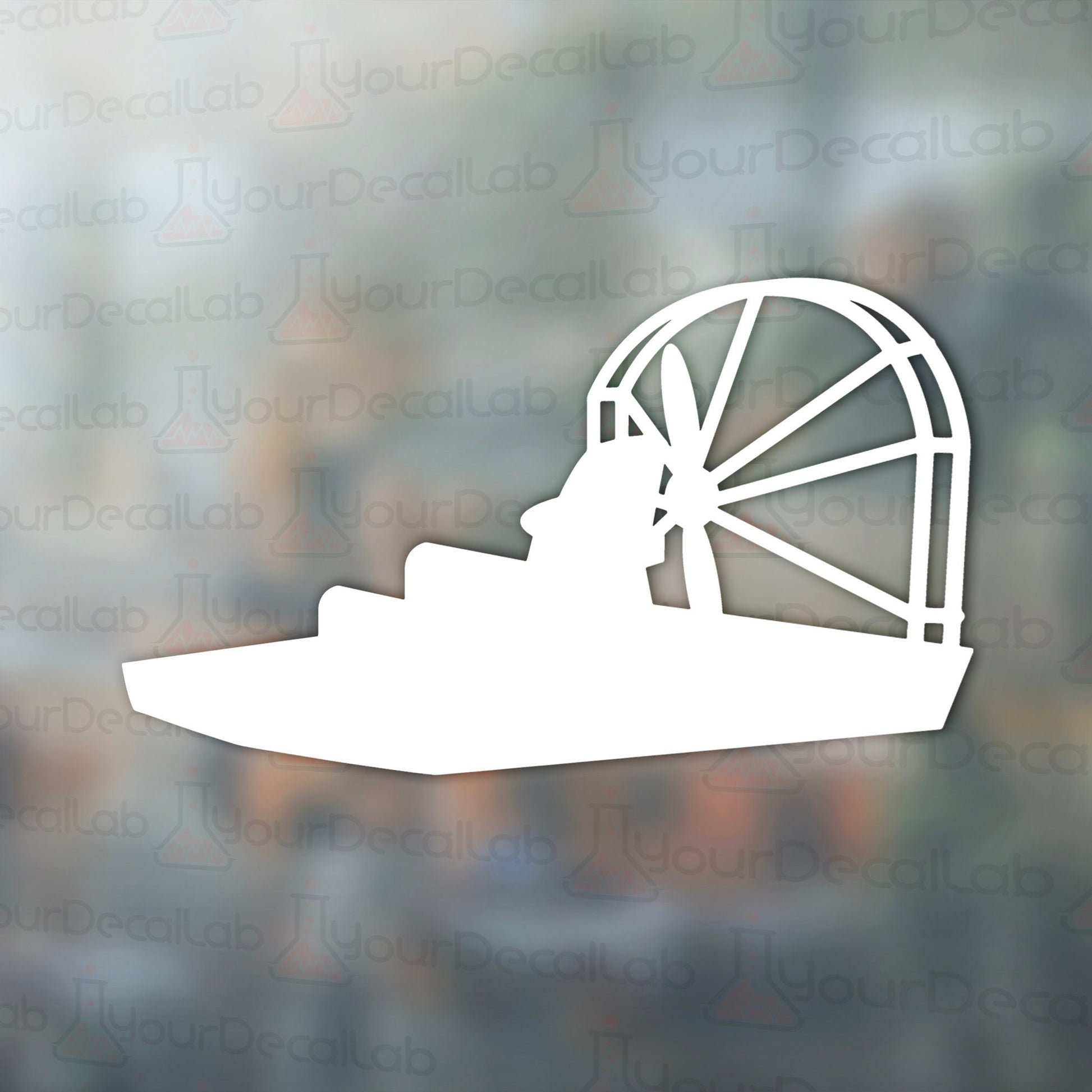 a white silhouette of a ferris wheel on a blurry background