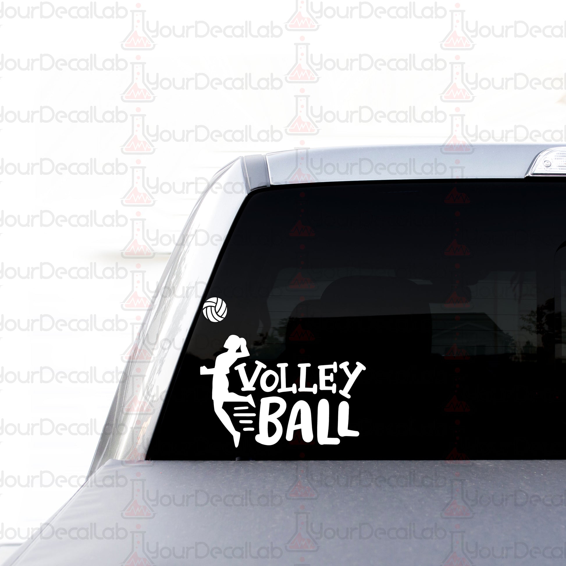 a volleyball sticker on the back of a car