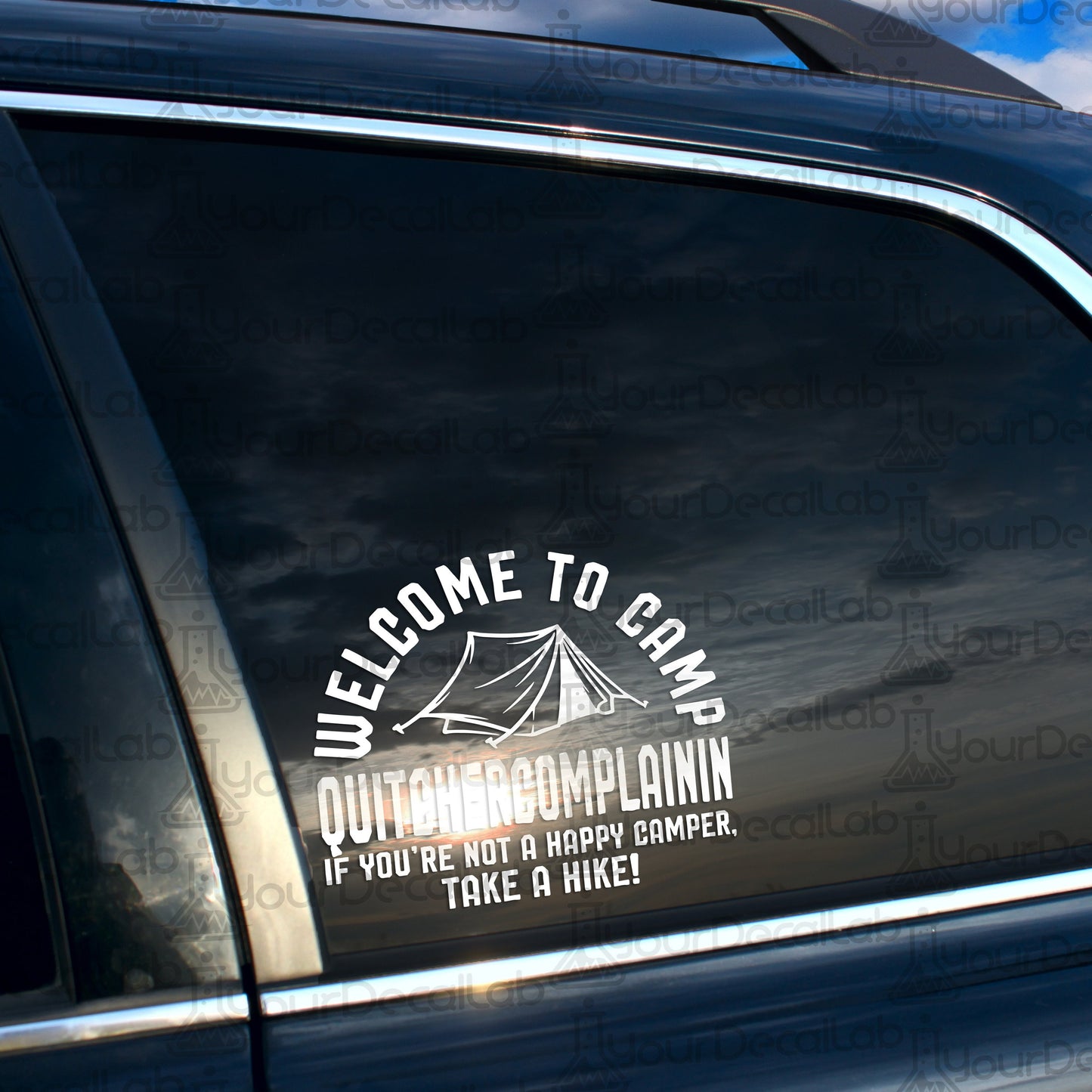 a car with a sticker that says welcome to camp