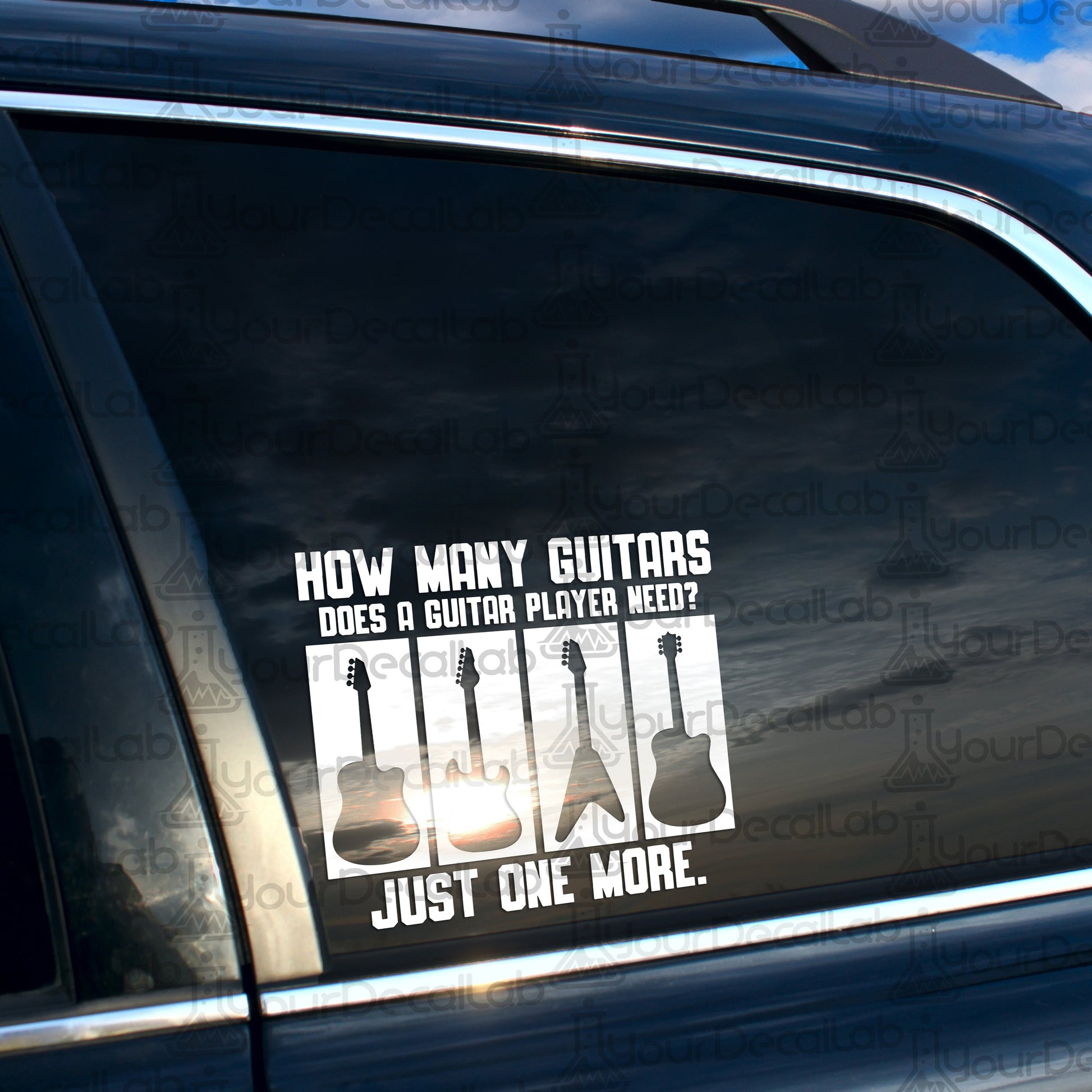 a car with a sticker that says how many guitars does a guitar player need
