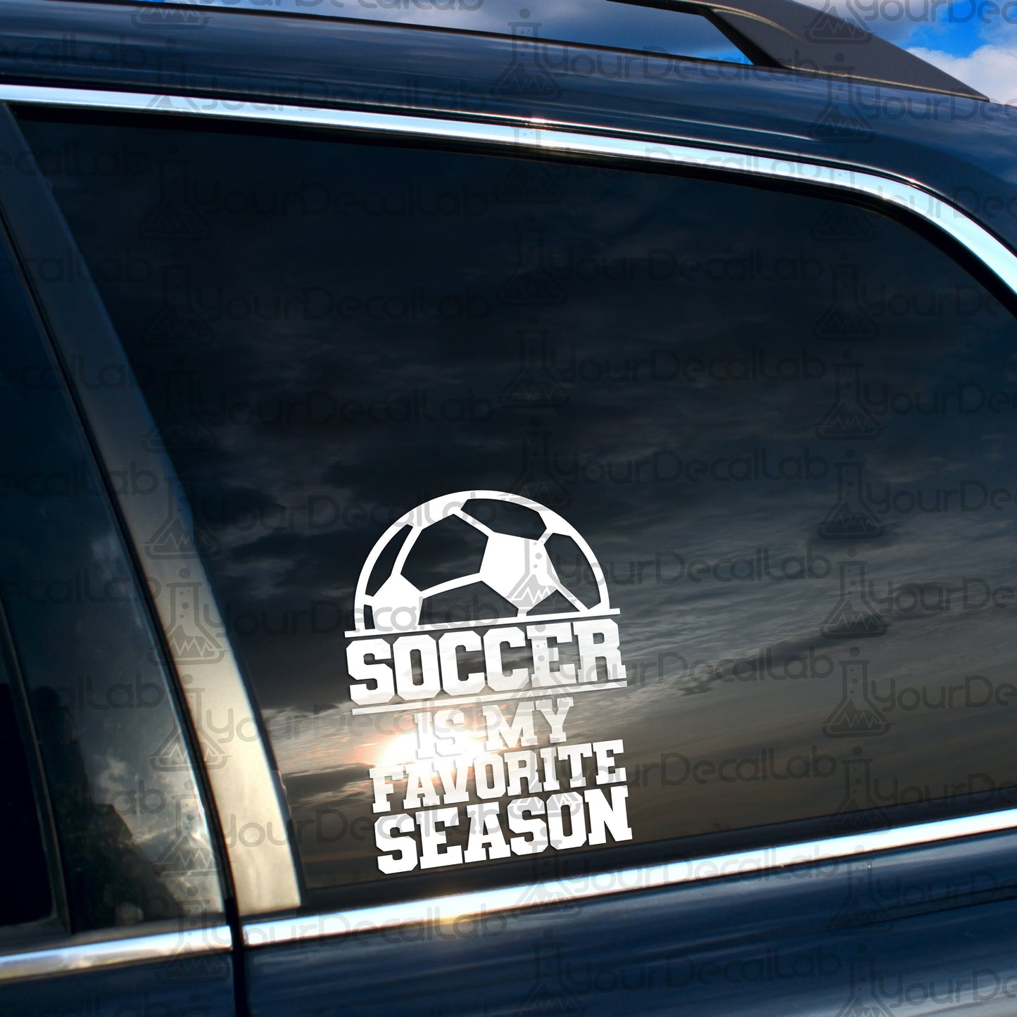 a soccer sticker on the side of a car