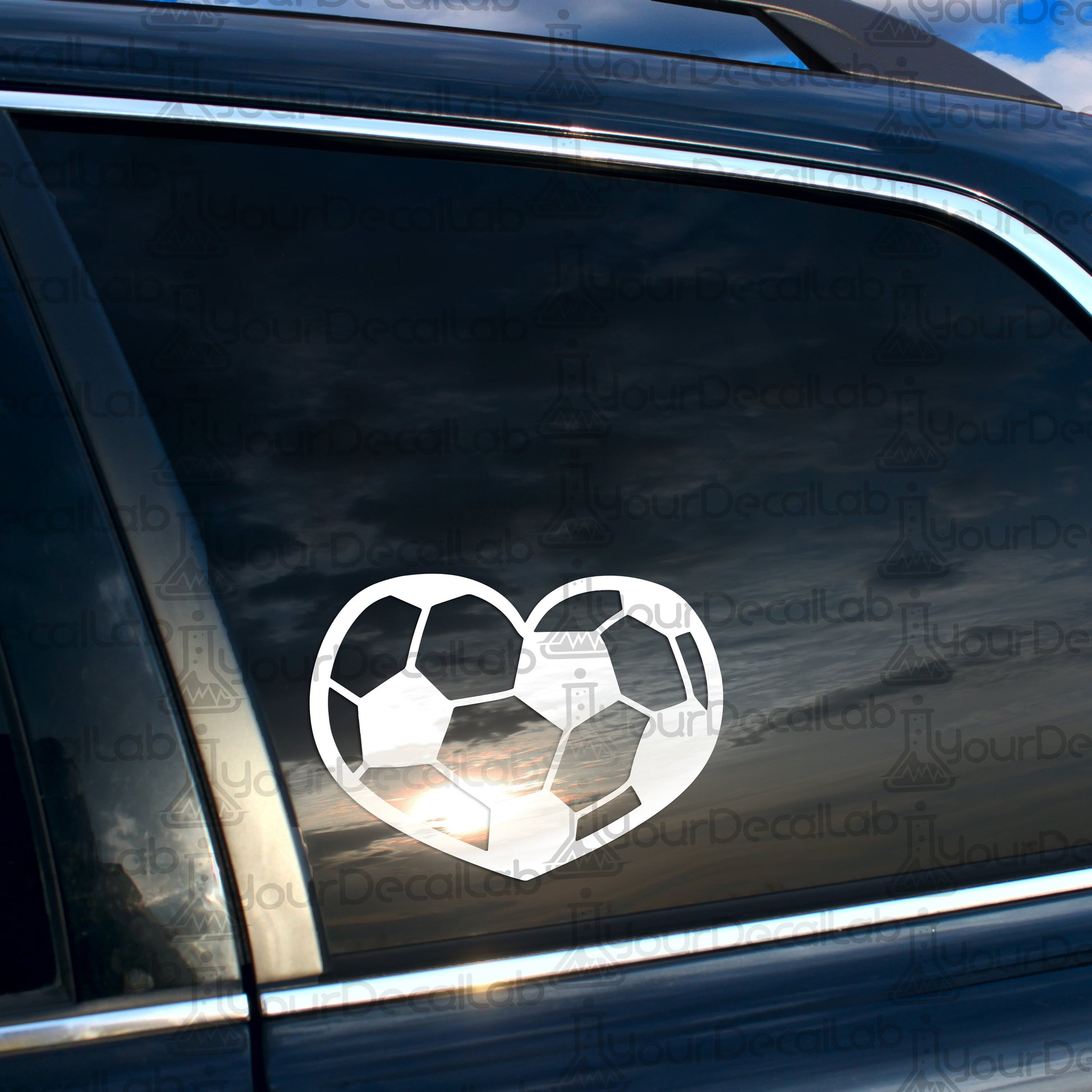 a car that has a sticker of a soccer ball in the shape of a
