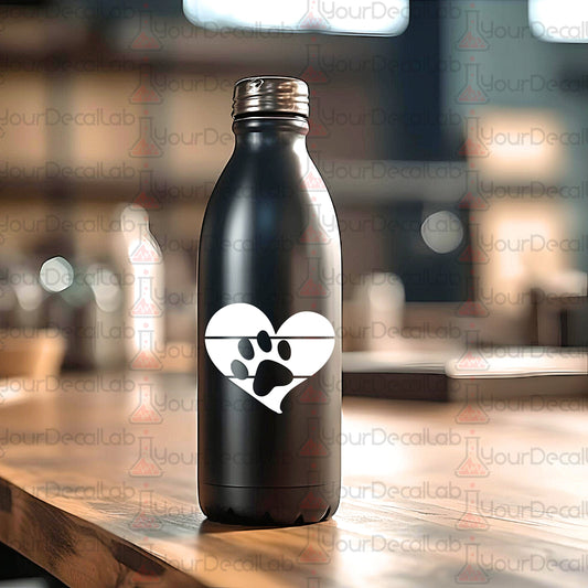 a black bottle with a white heart and paw prints on it