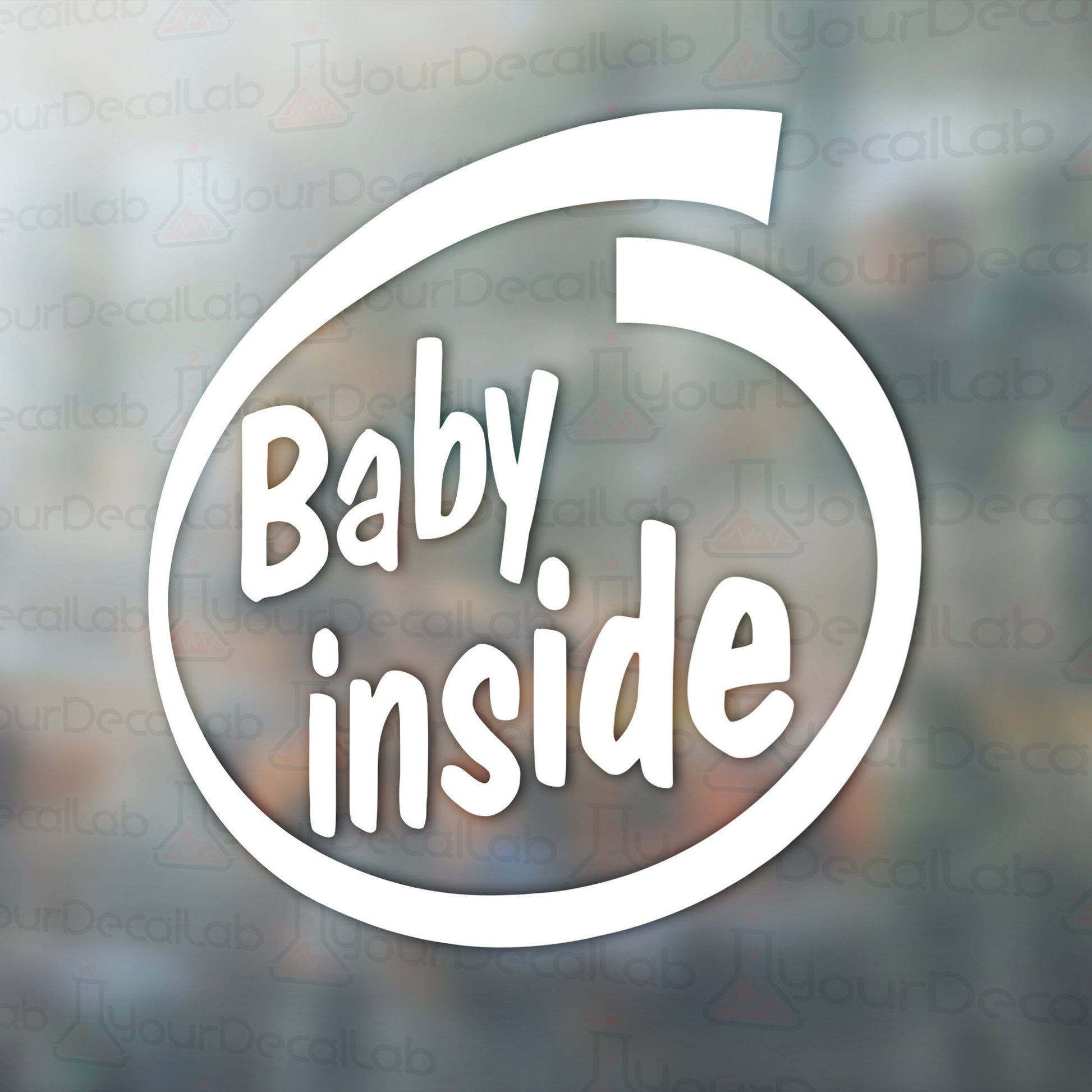 a baby inside sticker on a window