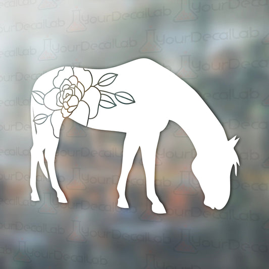 a white horse with a flower on it&#39;s head