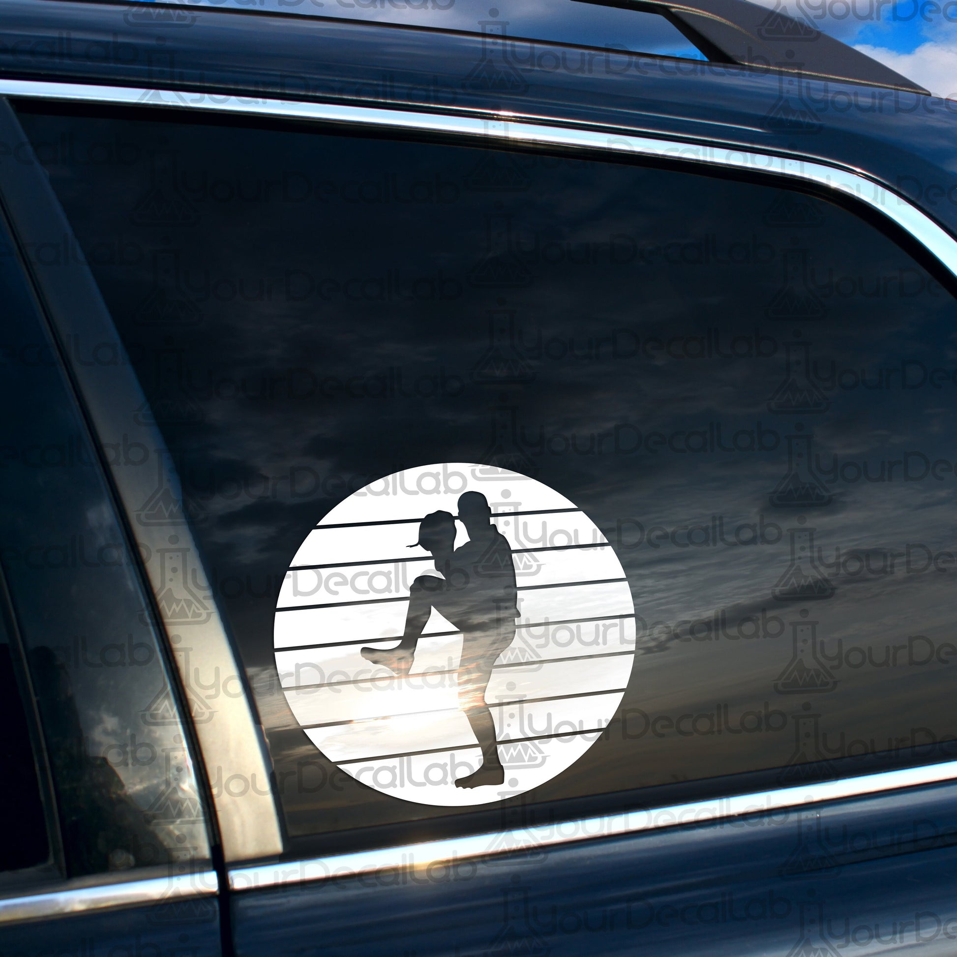 a car with a sticker of a man holding a tennis racquet