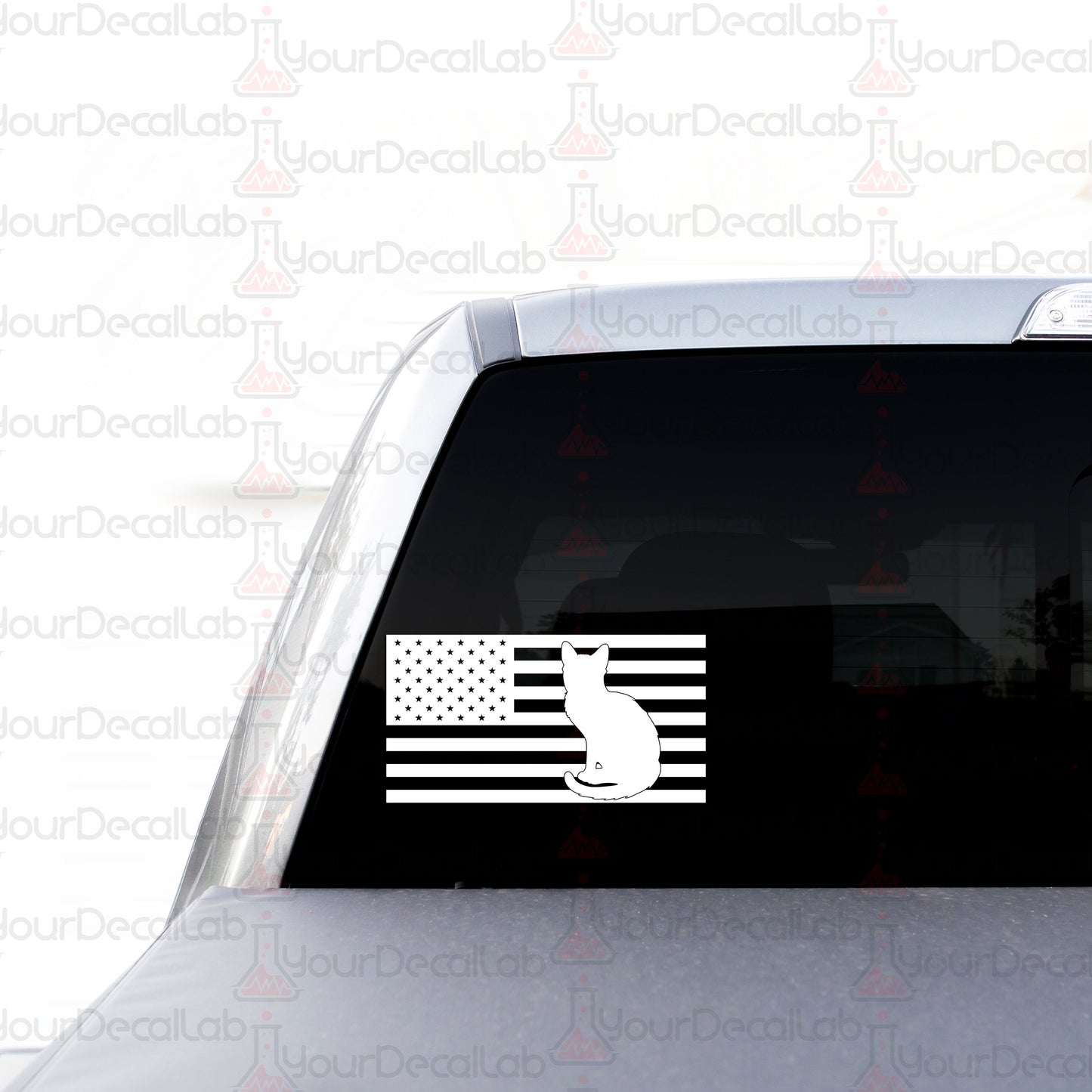 an american flag sticker on the back of a car