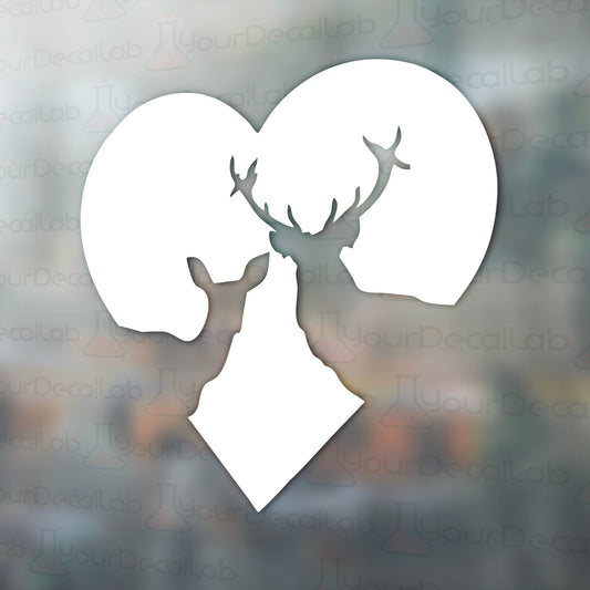 the silhouette of a deer&#39;s head in front of a heart