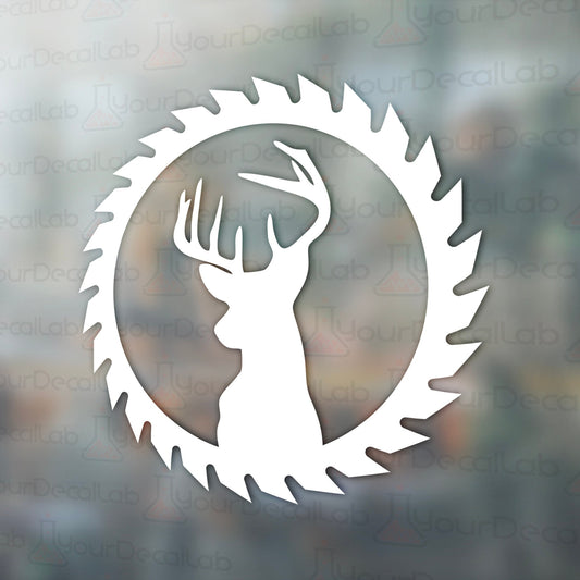a white deer head in a circle on a window