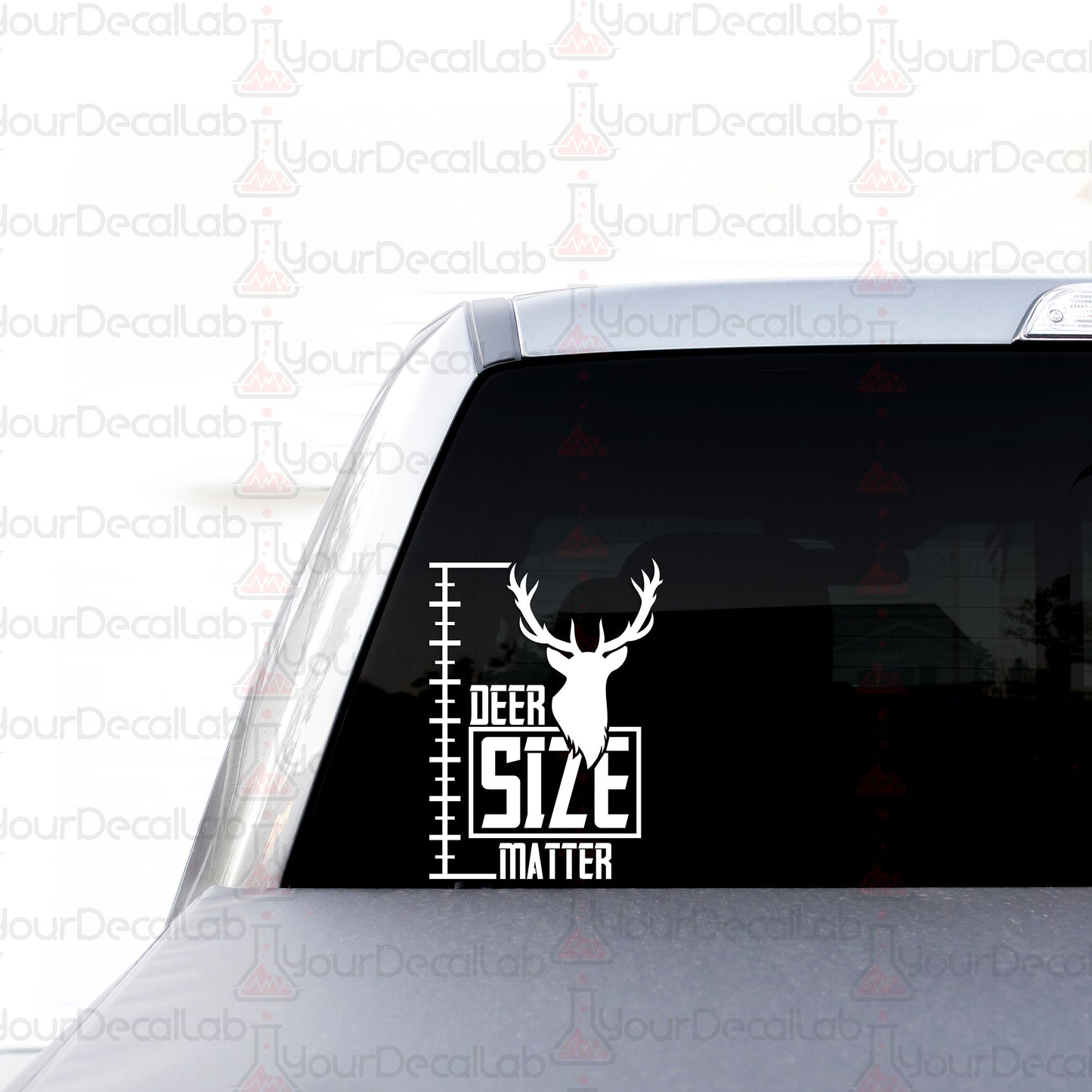 deer size matters sticker on the back of a car