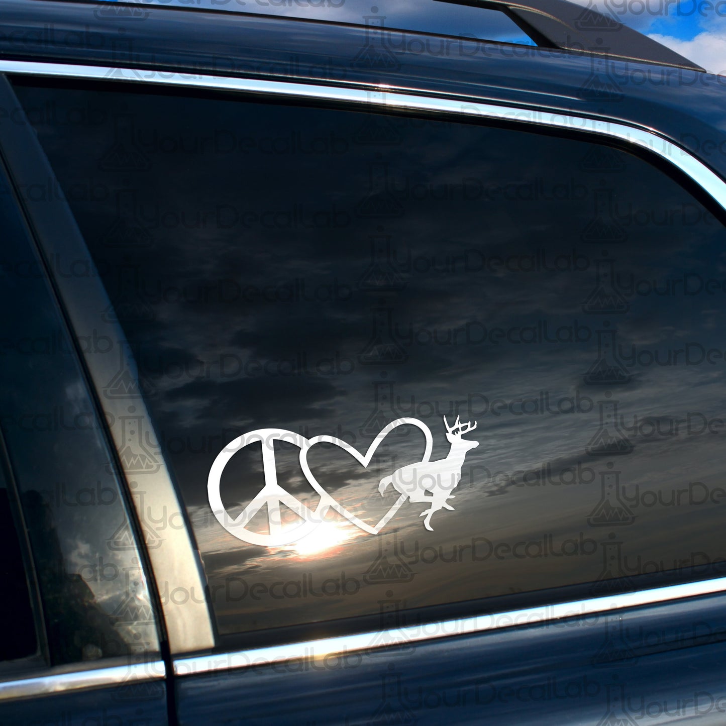 a car with a peace sign and a deer on it