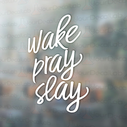 a window with the words wake pray slay on it