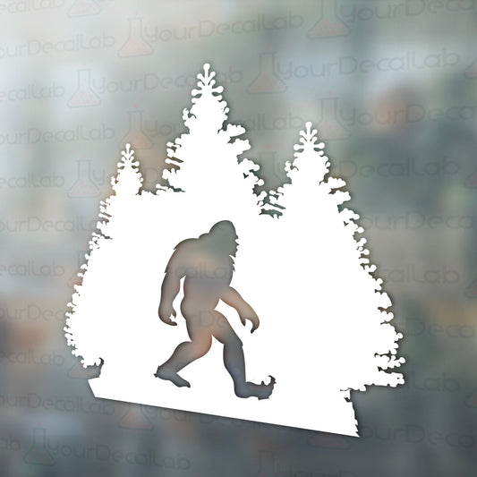 a silhouette of a bigfoot walking through a forest
