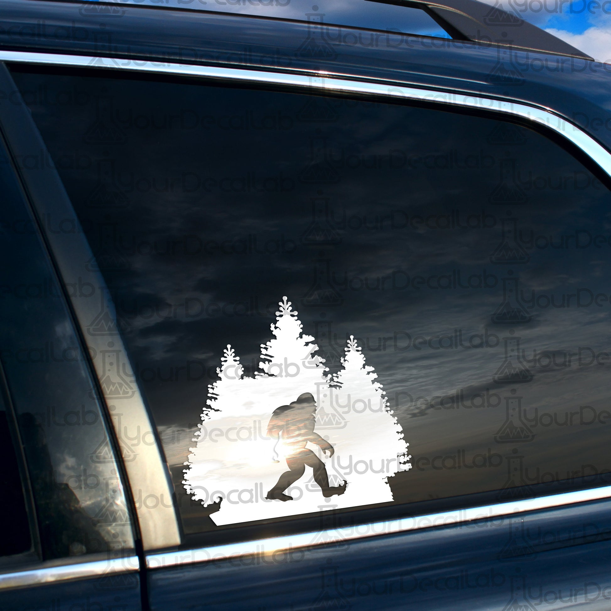 a car with a sticker of a person walking in the snow