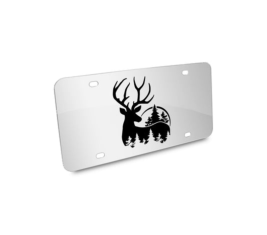 a white license plate with a deer and trees on it