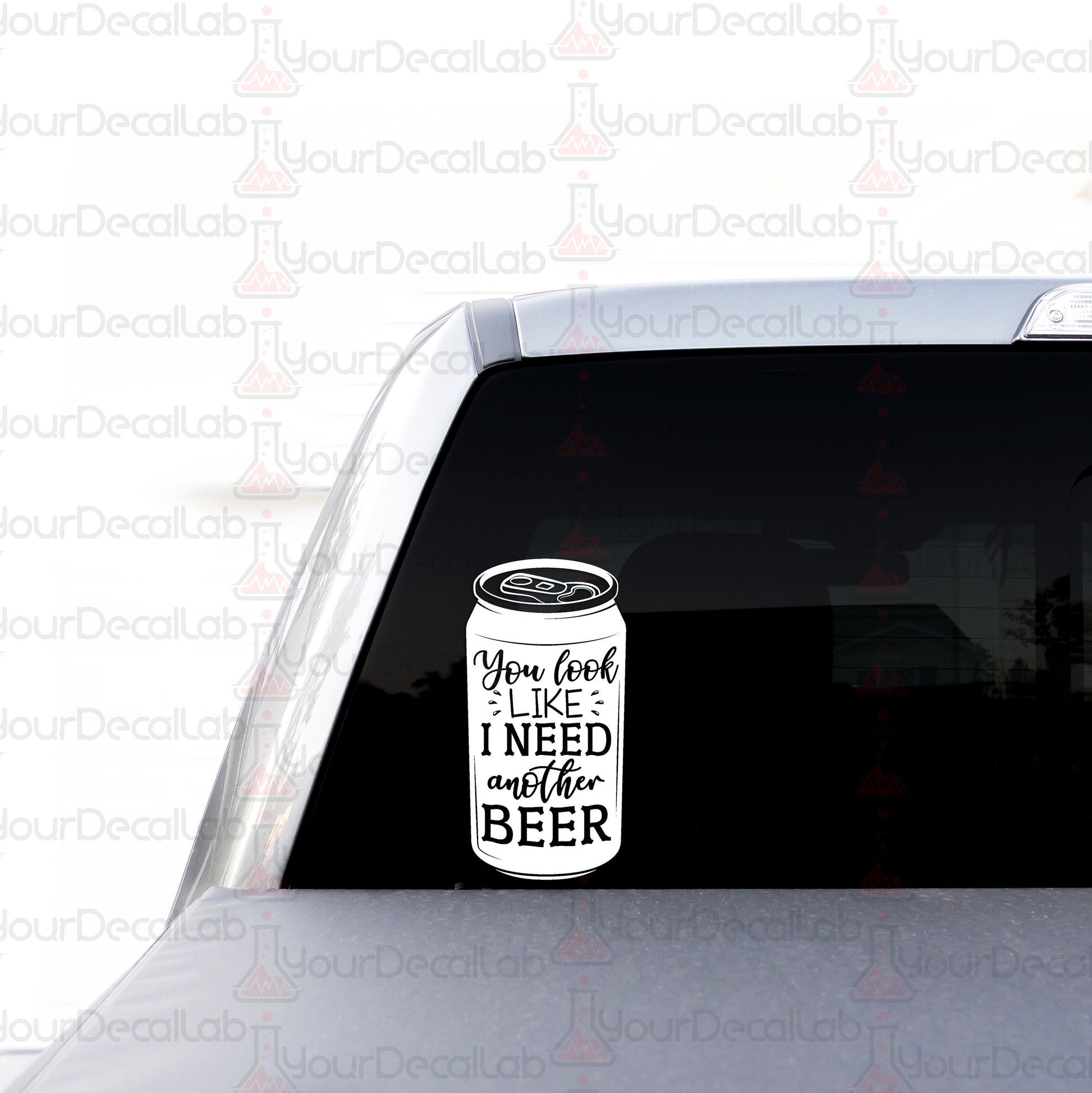 a beer can sticker on the back of a car