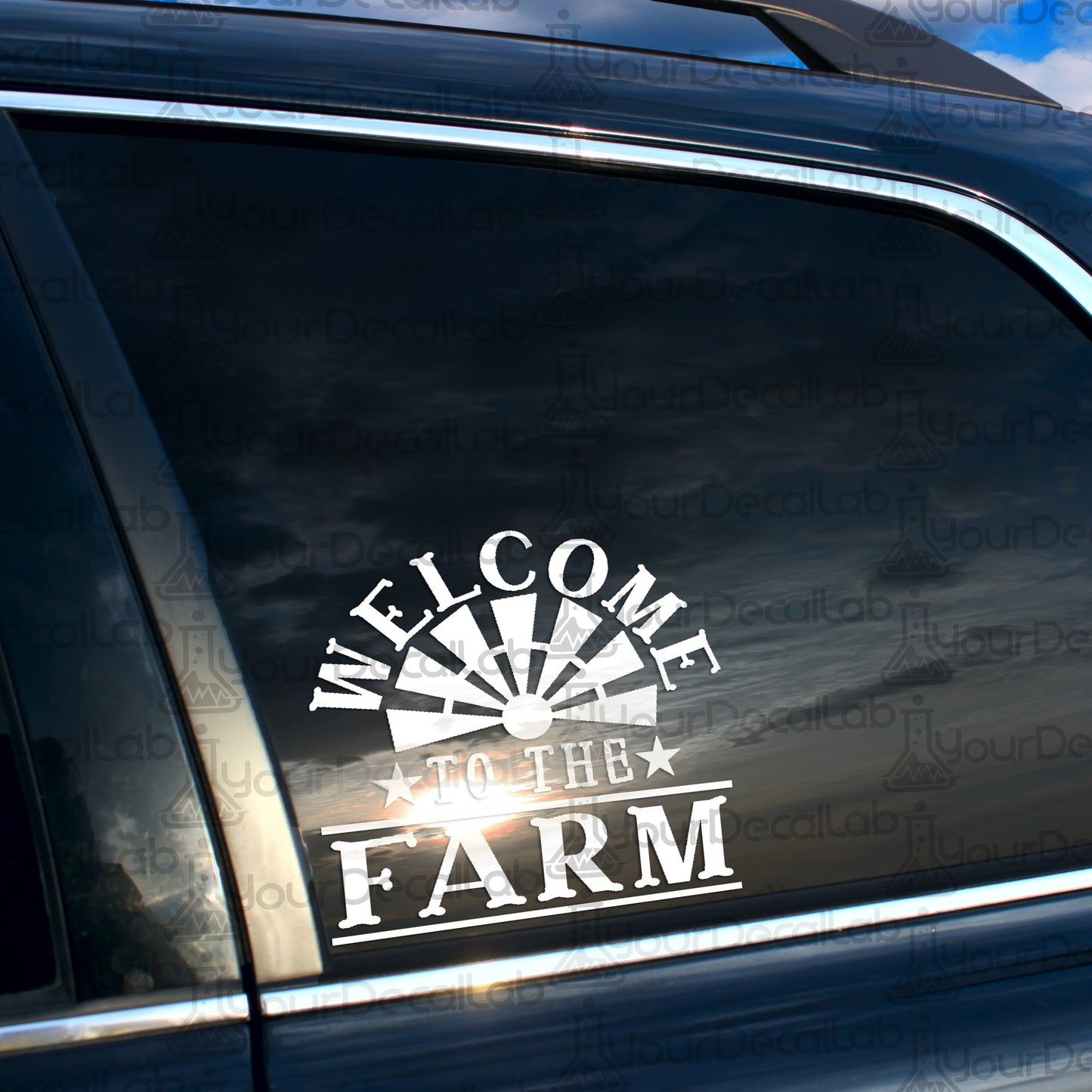 a welcome to the farm sticker on the side of a car
