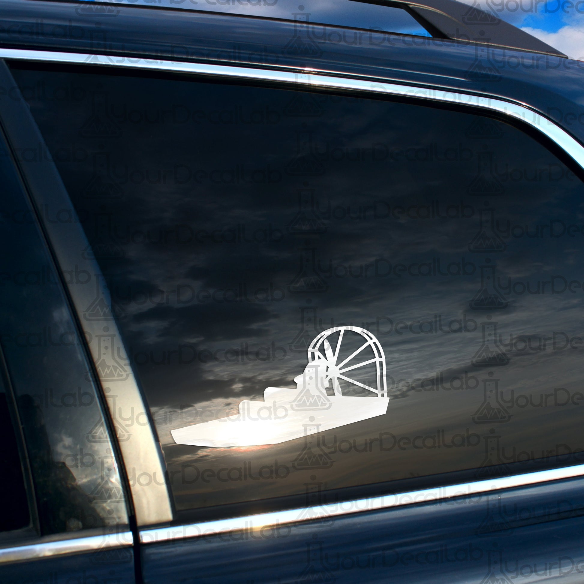a car with a reflection of a wheel on it