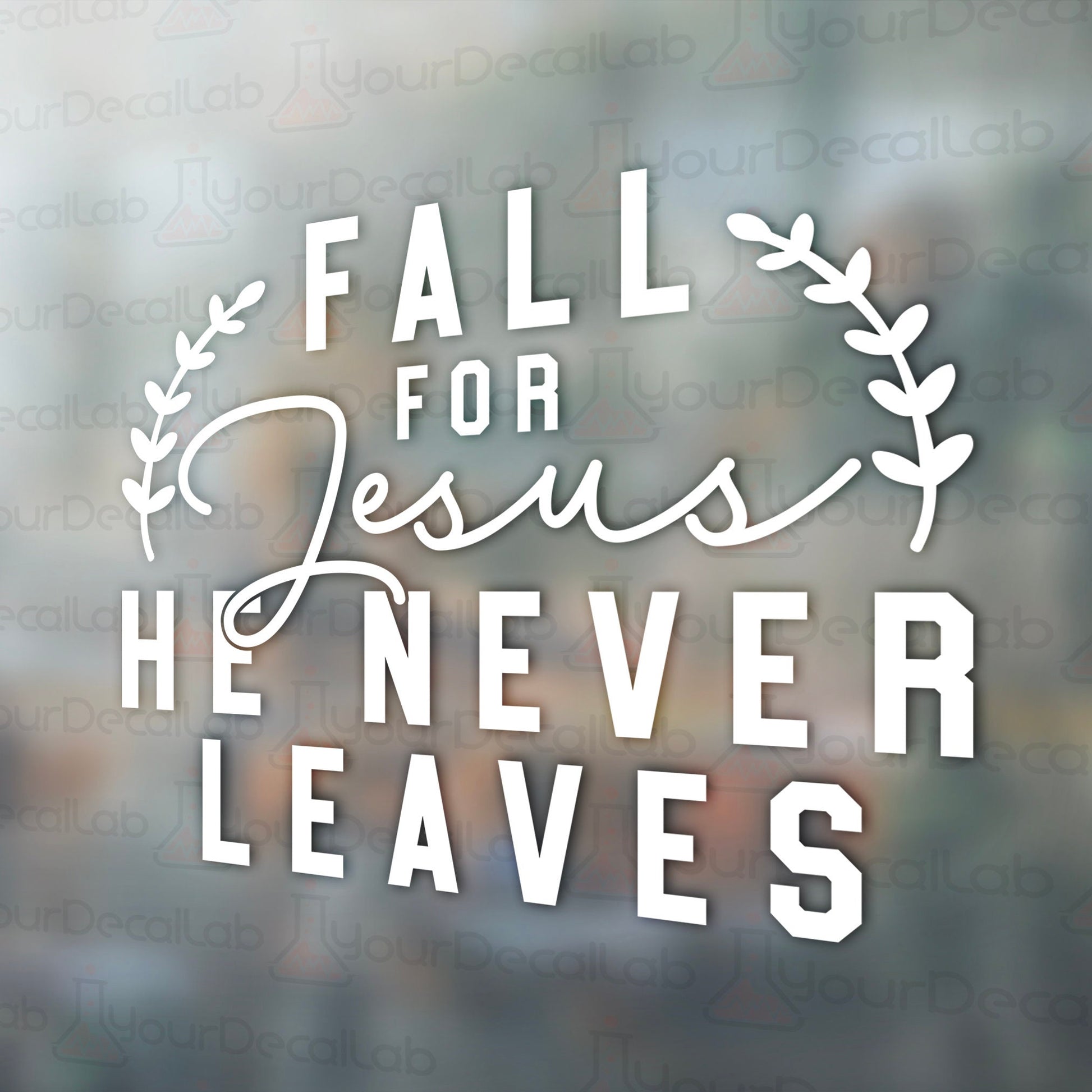 a window with the words fall for jesus, he never leaves