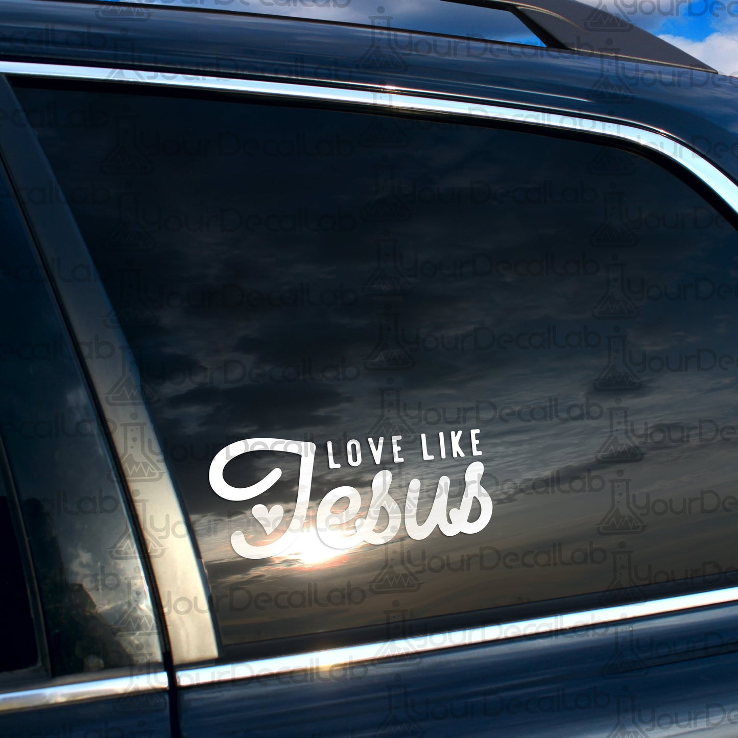 a car with a sticker that says love like jesus