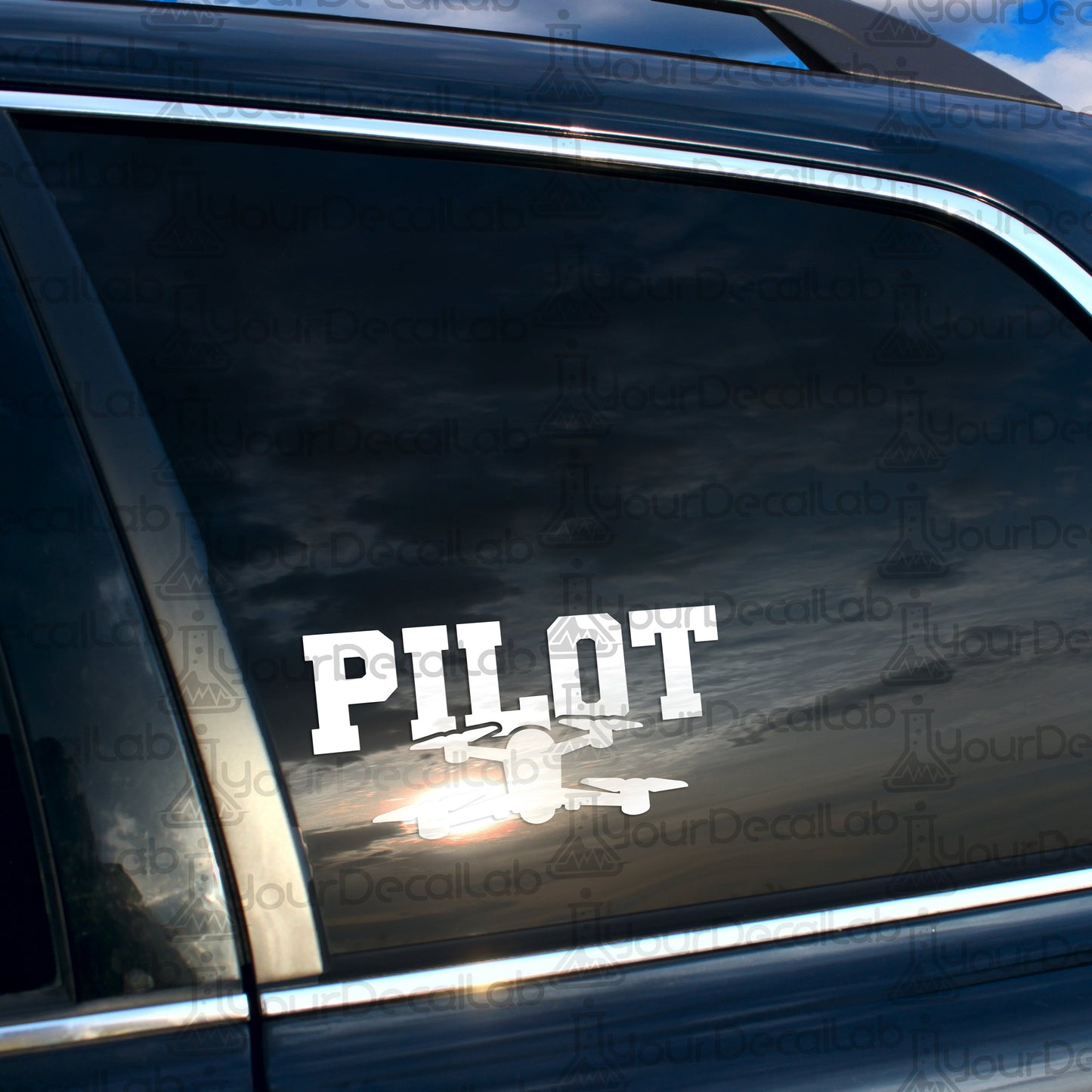a close up of a car window with the word pilot on it