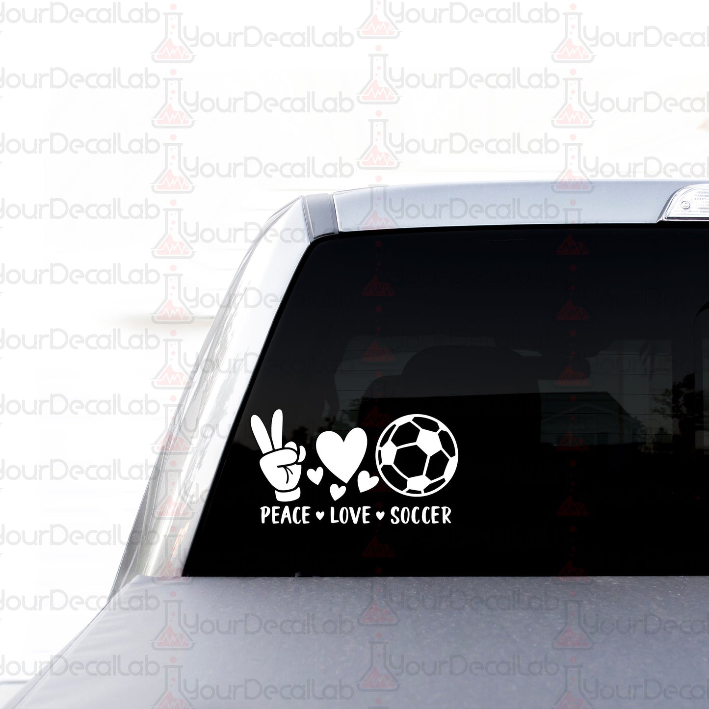 peace love soccer sticker on the back of a car