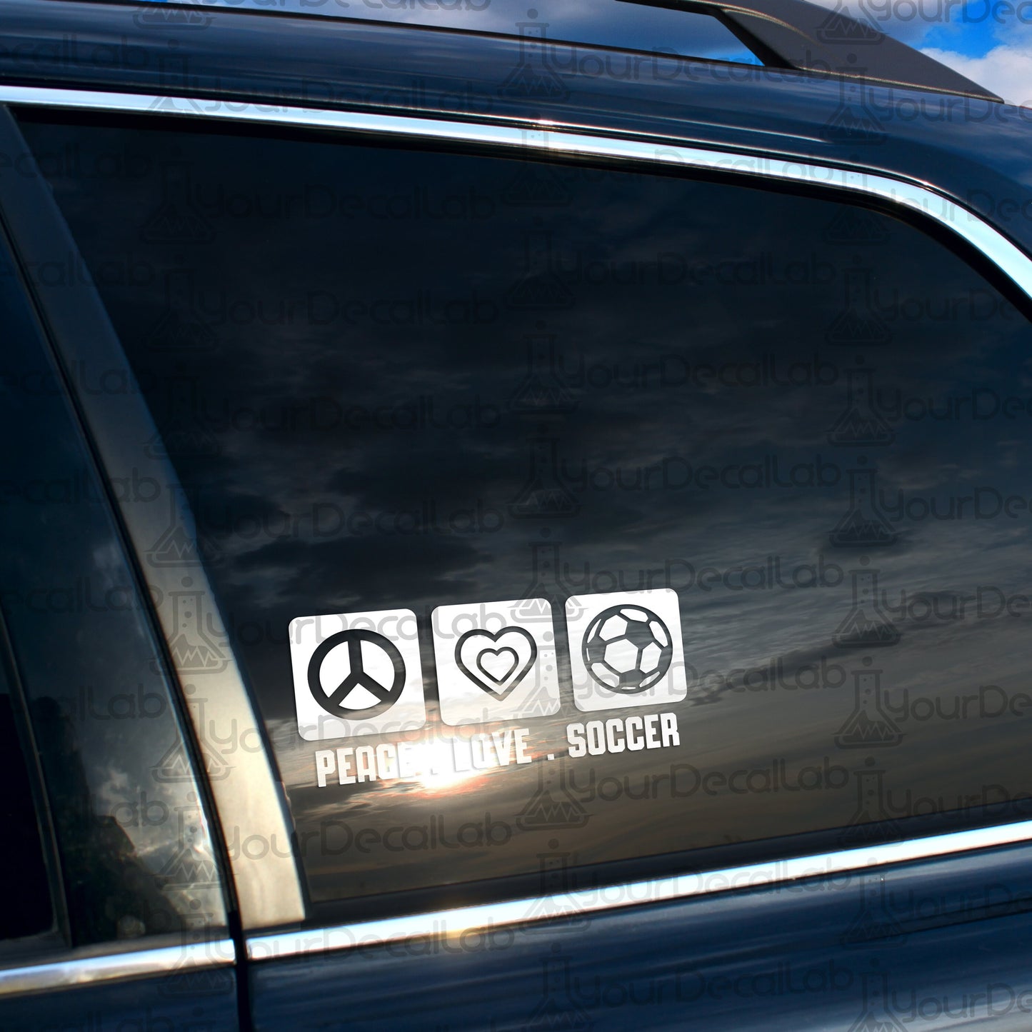 a car with a peace love soccer sticker on it