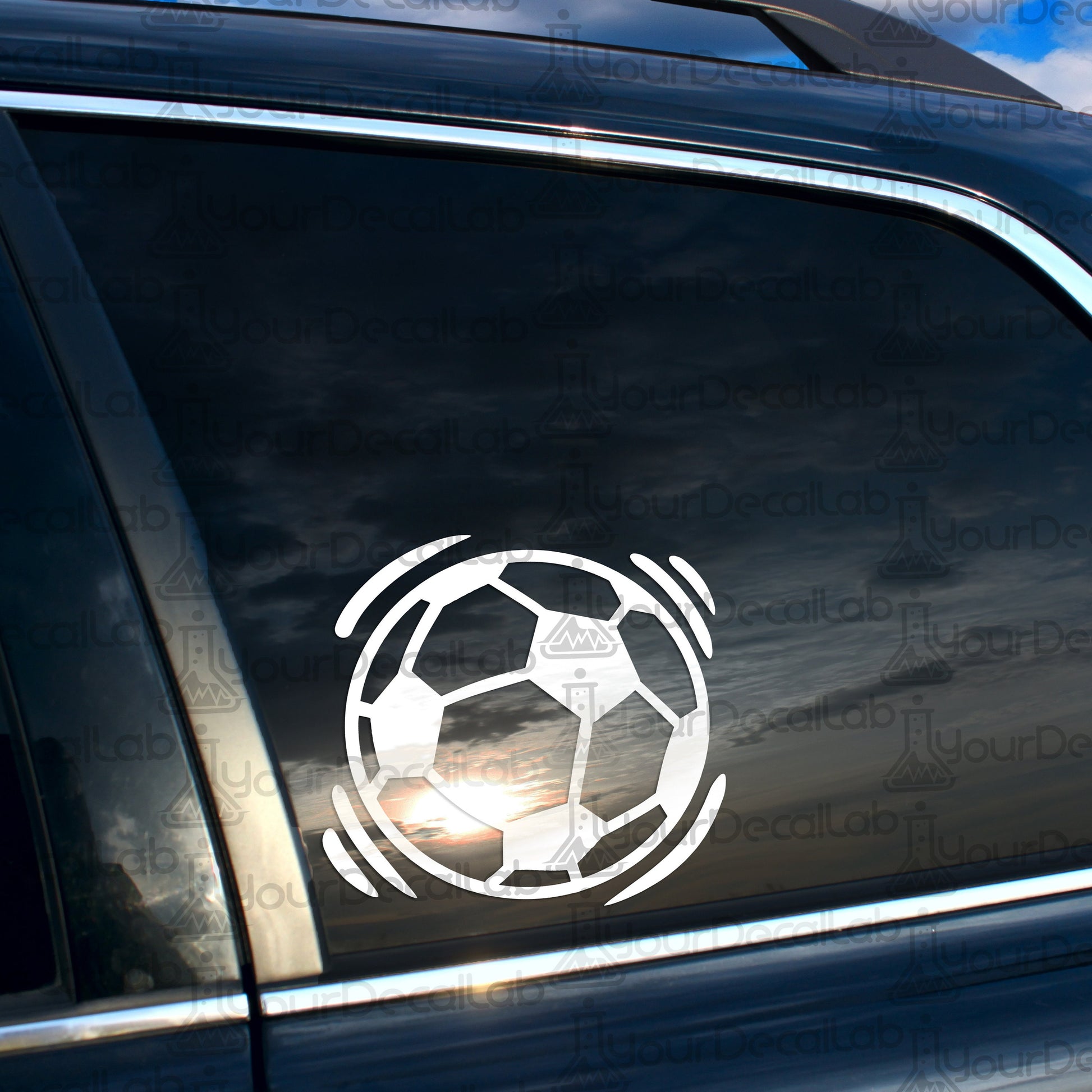a car with a sticker of a soccer ball