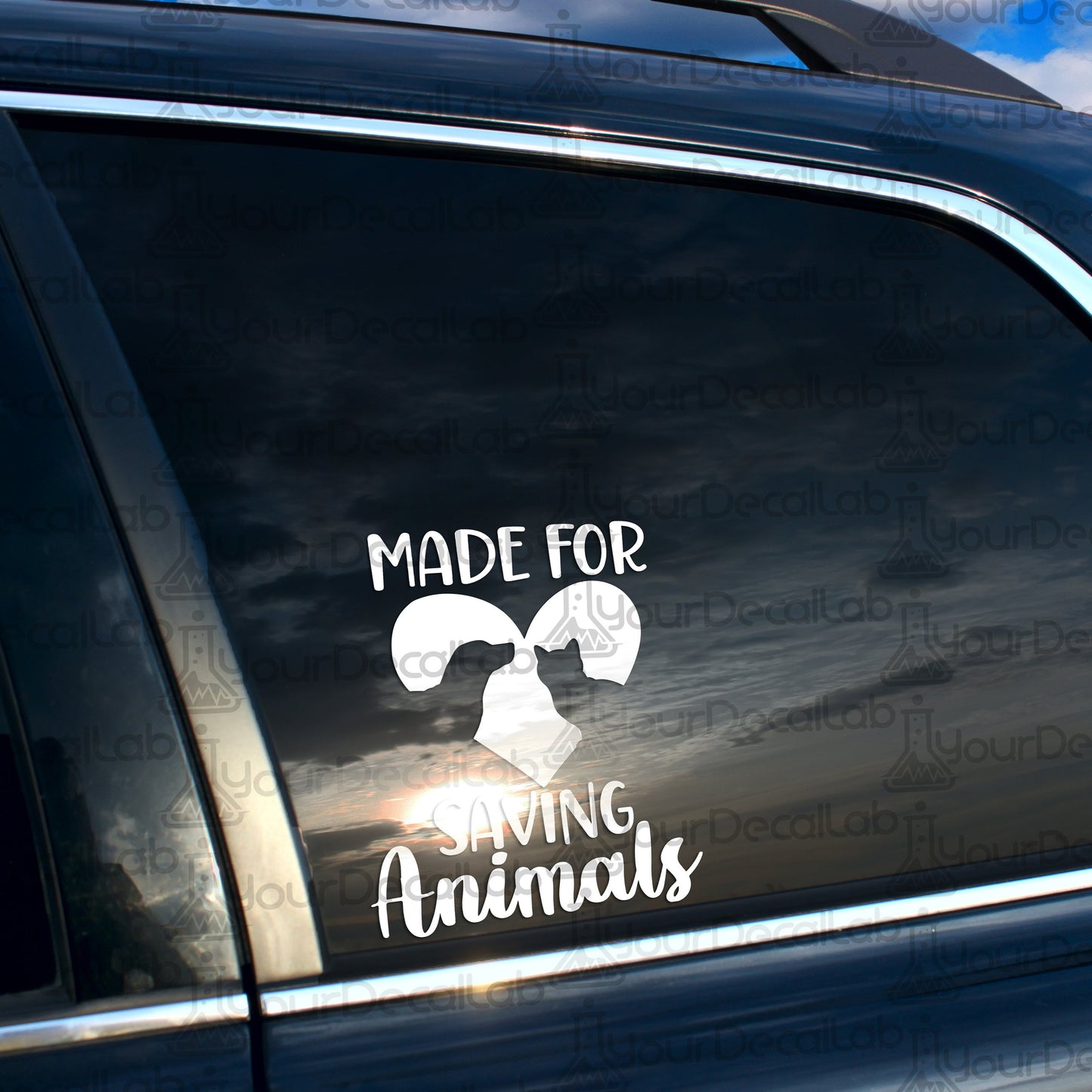 a car with a sticker that says made for saving animals
