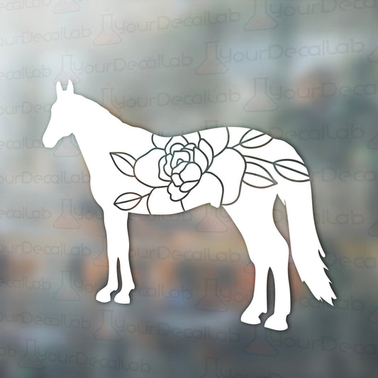 a white horse with a flower on it&#39;s back