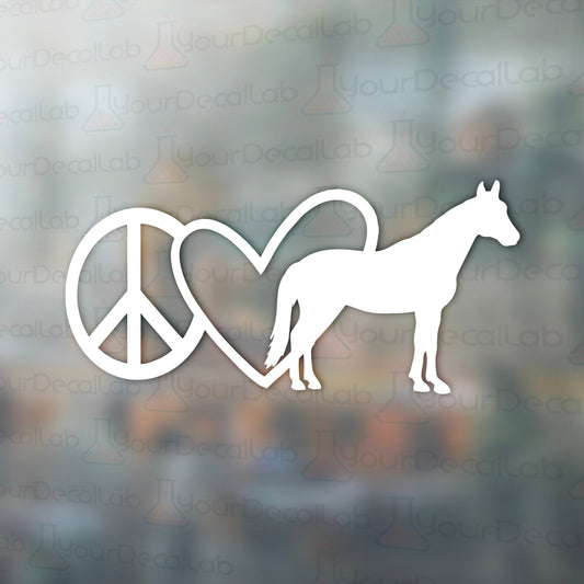 a peace sign and a horse on a window