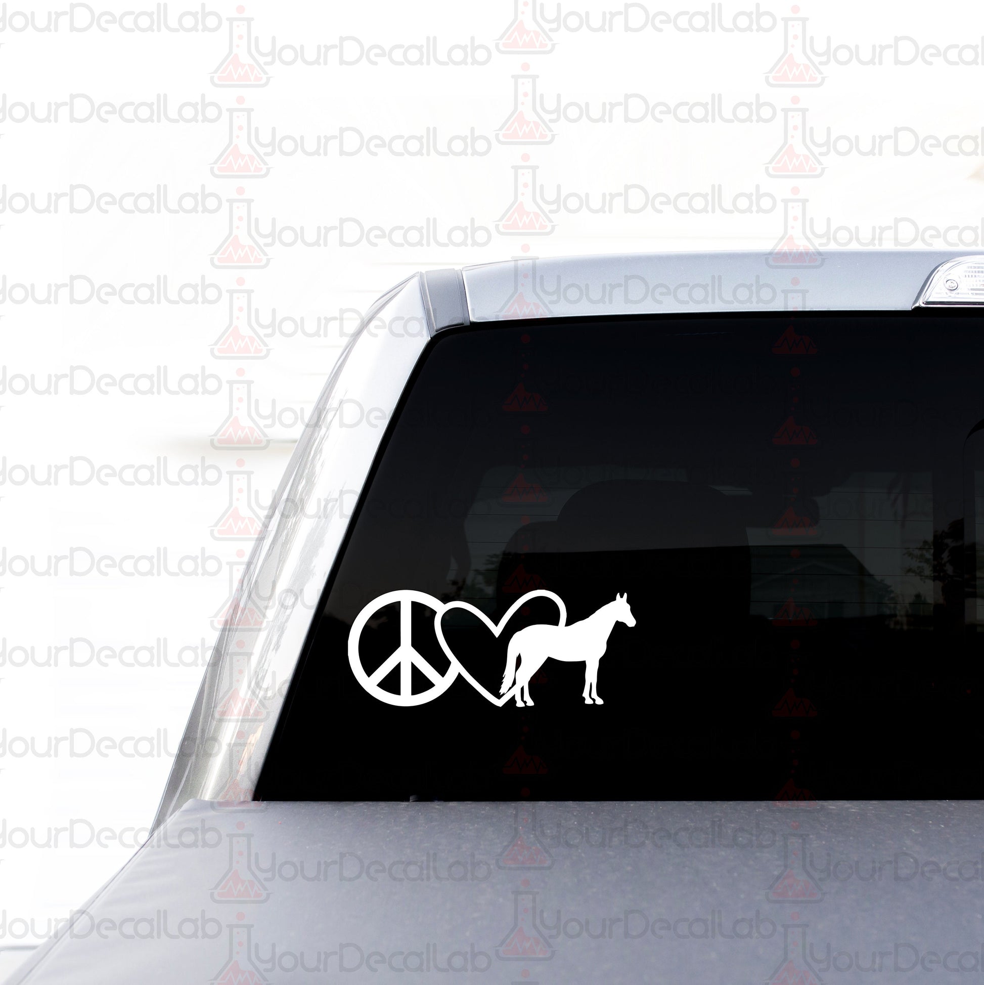 a car with a peace sign and a horse sticker on it