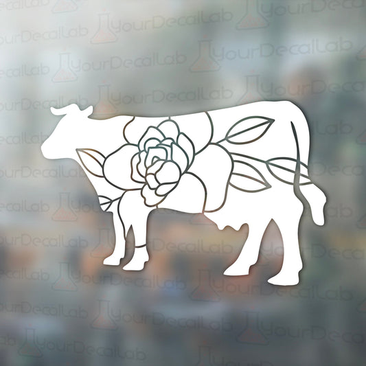 a picture of a cow with a flower on it
