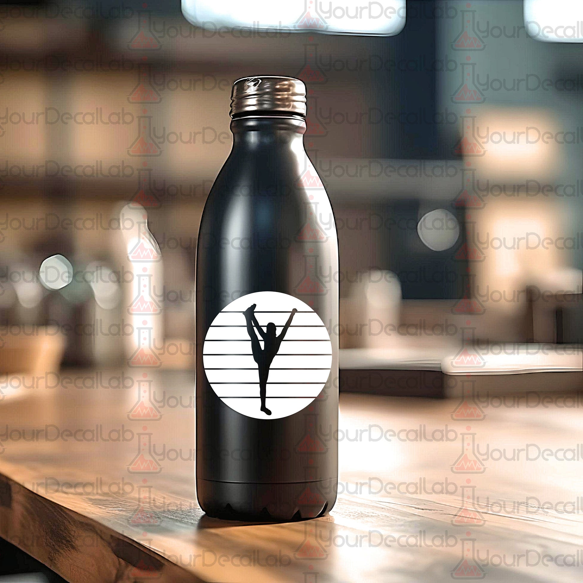 a black water bottle with a picture of a person doing a yoga pose