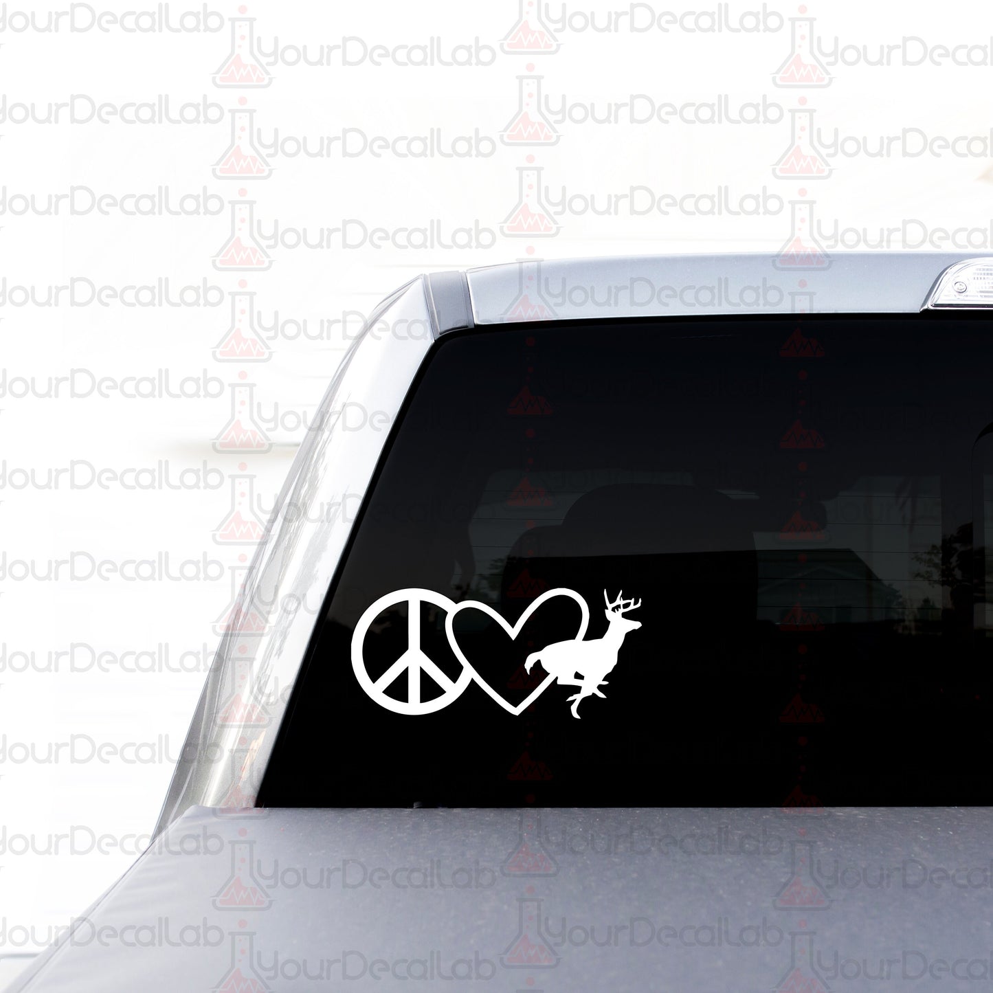 a car with a peace and deer decal on it