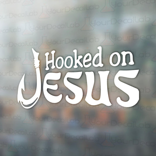 the words hooked on jesus on a blurry background