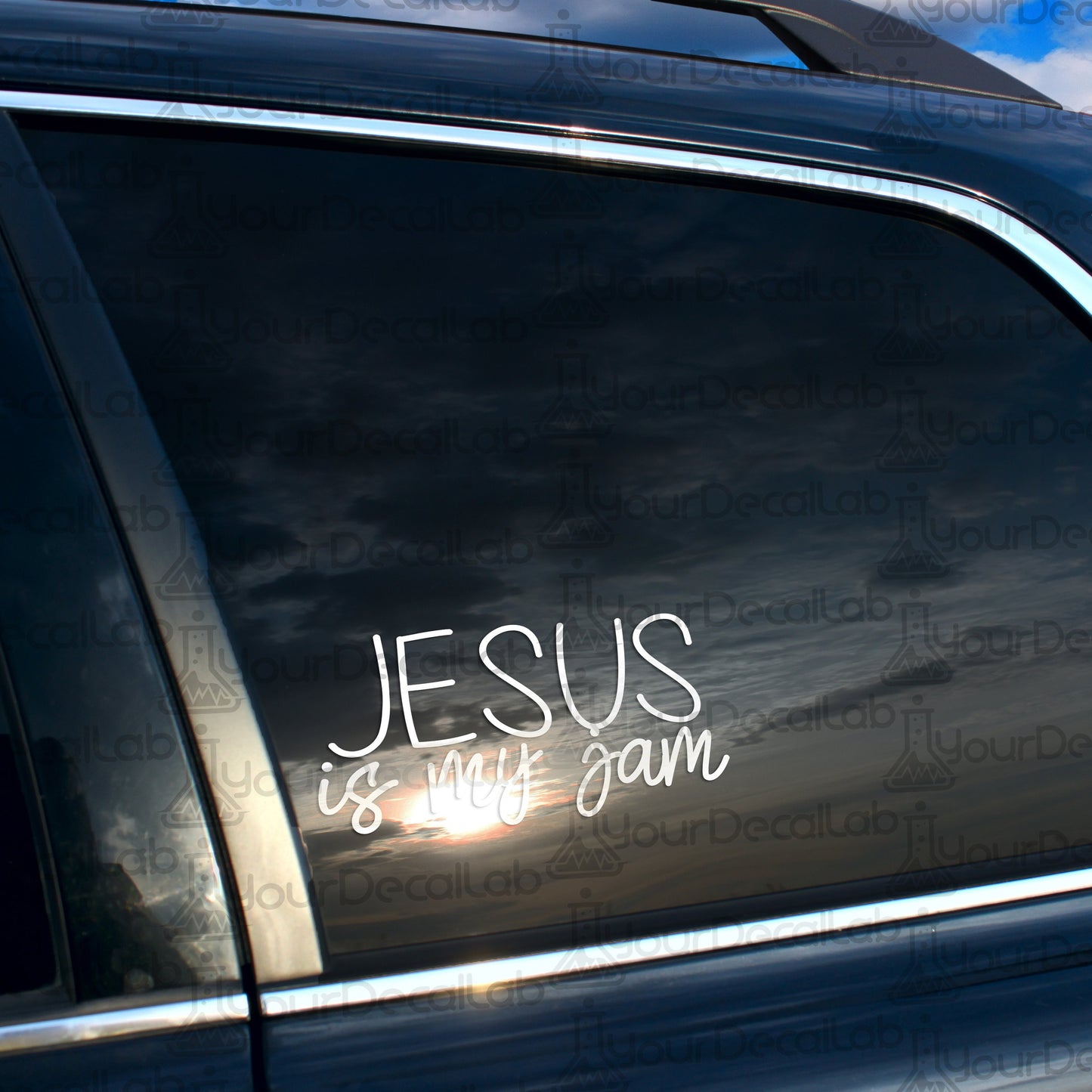 a car with a sticker that says jesus is the goat